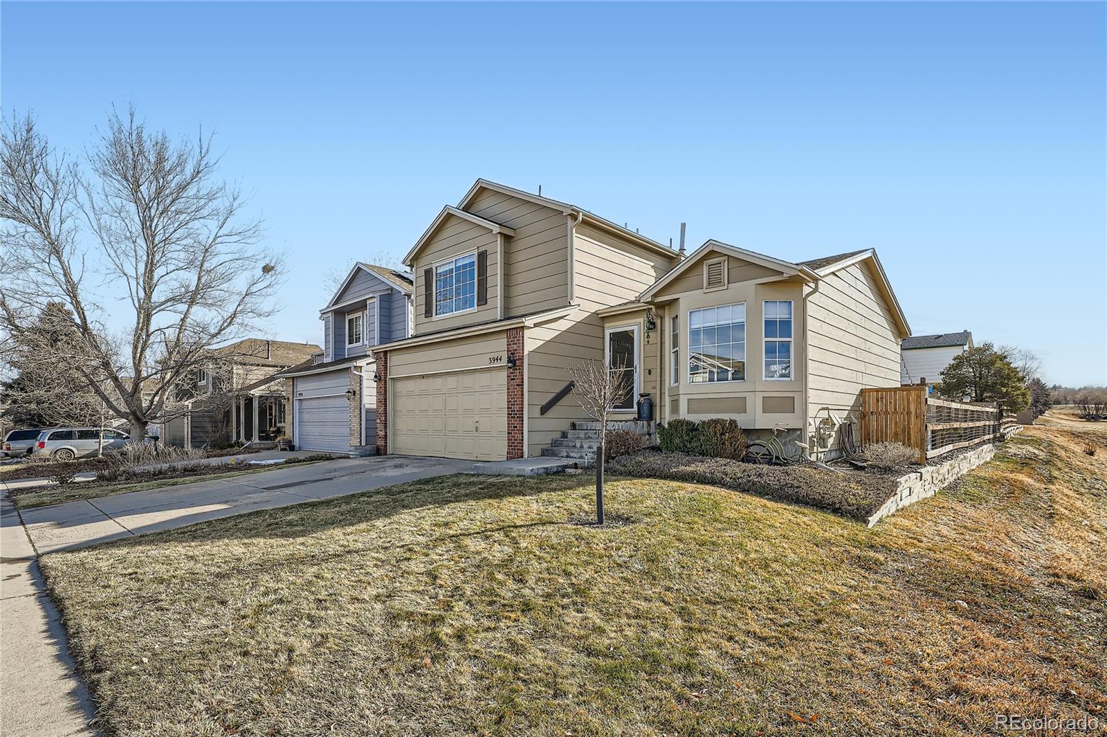 BEAUTIFUL 3 Bedroom, 3 Bath Home with Mountain Views! Enjoy Cooking in this Lovely, Bright, Updated Eat-In Kitchen (Appliances Included) with Oversized Island, Granite Countertops and Plenty of Cabinet Storage. Kitchen Opens to a Cozy Family Room and a Cute, Fully Fenced Backyard and Stamped Concrete Patio Perfect for Entertaining! More Entertainment Space in the Basement Perfect for Additional Family Room, Game Room, Exercise Room, Office Space OR 4th Ensuite Bedroom. Primary Bedroom Includes Walk In Closet and Private Bathroom with Double Sinks & Mirrors. Additionally, Note the Generous Corner Lot, Easily Maintained by Surrounding Sprinkler System. Wonderful Curb Appeal with Walking Trails and Playground Across the Street. Worry-Less Living with Newer Roof Installed 2014, Solar Panels Installed 2018 and New Water Installed 2024. Walking Distance to Neighborhood Schools. 
Owner Pride Visible Throughout!