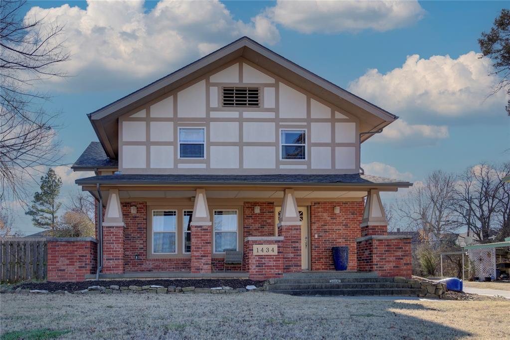 This wonderful 3 bedroom, 2 and a half bath property in the heart of Putnam Heights has historic charm with modern updates! As you walk up to the house, you'll love the spacious covered porch—an ideal spot for sipping coffee or enjoying the sunset. Inside, you'll find a warm and inviting layout. The main floor includes a handy butler's pantry with a wet bar, perfect for entertaining.  The primary suite is truly a retreat, featuring a recessed ceiling and soft lighting that creates a relaxing atmosphere. The master bathroom is spacious, with a large tiled shower that has dual showerheads, along with a big walk-in closet. The two staircases add a unique touch, allowing easy access to the upstairs. The secondary bedrooms are comfortably sized. The bonus room, filled with natural light, can be a perfect home office, play area, or reading nook. The large backyard is perfect for entertaining, featuring a gazebo and a cozy firepit for those chilly evenings. Plus, you'll have peace of mind with a new Class 4 roof that was just installed in 2023. Don’t let this gem slip away! Schedule a tour today to see all the charm and comfort this home has to offer!