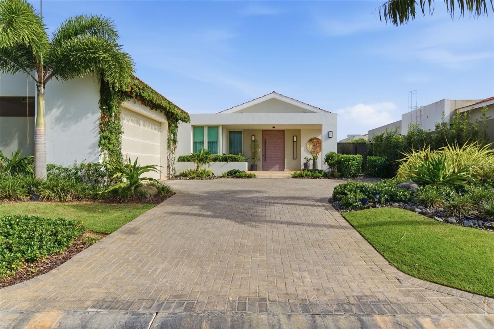 Located in the desirable Isla Norte area, this stunning newer-construction residence offers refined modern living with exceptional privacy and serene natural surroundings. Built in 2023, the home spans approximately 5,100 square feet of interior living space, not including the expansive terrace and landscaped backyard, and is thoughtfully designed for both elegant entertaining and everyday comfort.The residence features four bedrooms, including three spacious ensuite bedrooms, plus a versatile fourth room ideal for a home office, guest room, or den. In total, the home offers four full bathrooms and two half bathrooms, one of which is a unique outdoor bath, seamlessly blending indoor and outdoor living.The backyard is a true retreat, showcasing a private pool, a beautifully finished terrace, lush mature landscaping, and a dedicated outdoor grill and entertainment area. With open views of protected greenery and the natural landscape of Sabanera, the property enjoys exceptional tranquility, minimal neighboring homes, and an elevated sense of privacy, perfect for hosting gatherings or relaxing in a peaceful setting.The home is beautifully furnished by interior decorators and is offered fully furnished, excluding artwork and select vintage pieces. Additional features include a covered attached garage, modern finishes throughout, and a seamless layout that maximizes light, flow, and connection to nature.Residents enjoy access to the amenities of Sabanera Dorado, including club access, fitness facilities, walking trails, and 24/7 security, as well as proximity to the renowned TASIS School.