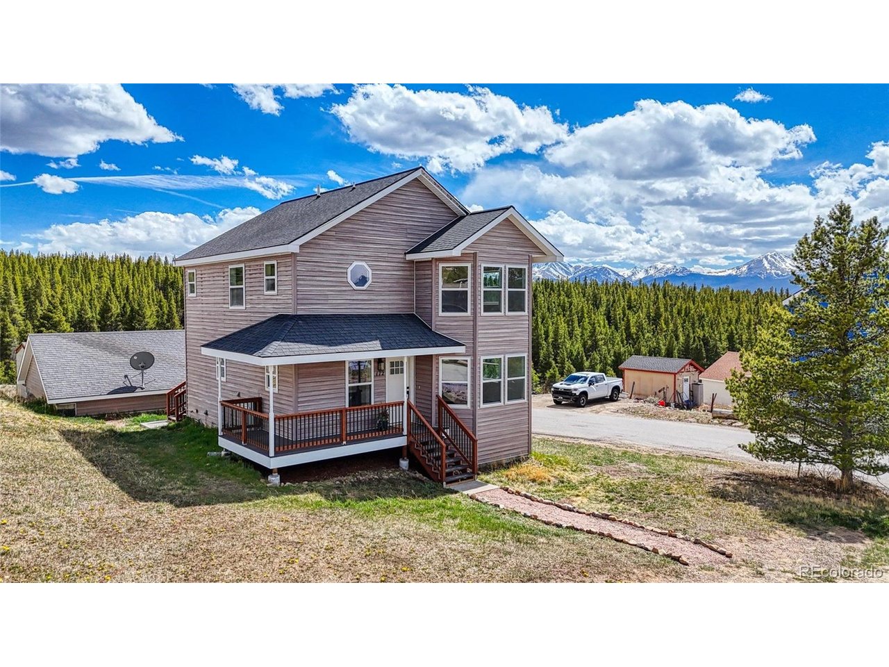 Beautifully renovated & spacious, this 3-bedroom, 3.5-bath home combines modern updates with the mountain lifestyle that makes Leadville such a special place to live. Located just minutes from downtown, enjoy easy access to hiking & biking trails, rafting, ATV adventures, the paved Mineral Belt Trail & Turquoise Lake for boating, fishing & camping. Take in views of Mt. Massive & Mt. Elbert with Colorado's high-country recreation right outside your door.Inside, the home has been thoughtfully updated with a clean, modern feel while maintaining warmth & character. New scratch-resistant waterproof luxury vinyl plank flooring runs throughout & is complemented by fresh interior paint, updated lighting, new solid-core doors & modern finishes.The fully redesigned kitchen serves as the heart of the home, featuring custom cabinetry, quartz countertops, tile backsplash, bar-top seating, all-new appliances & a water filtration system at the sink. Designed for both everyday living & entertaining, it easily becomes a natural gathering space.The spacious primary suite offers mountain views, a walk-in closet with updated shelving & a beautifully remodeled five-piece bath featuring a soaking tub & renovated shower with designer tile & frameless glass.Additional updates include refreshed bathrooms with updated vanities & fixtures, approximately 80% of windowpanes replaced, new front & rear exterior doors, serviced radiant heating with upgraded zones. A 2-car detached garage with a new garage door & motor. A wraparound covered front porch, rebuilt deck stairs & refreshed decking create inviting outdoor spaces.The finished basement adds flexibility with a bonus room ideal for an office, workout space, guest room, or non-conforming bedroom.Move-in ready & extensively updated, this home offers the opportunity to enjoy mountain living with comfort, convenience & adventure all close by.