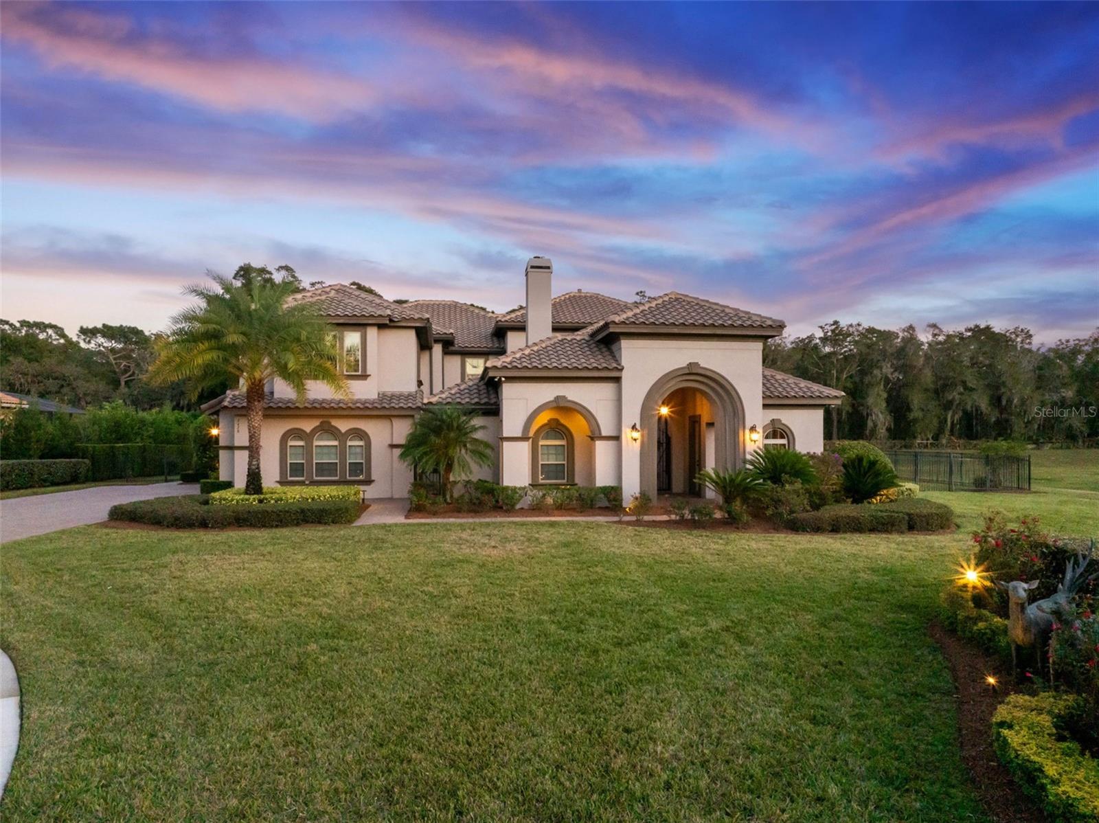 Under contract-accepting backup offers. If you'd like your dream home to feel like a permanent vacation...congratulations, you just found it! This home sits on an acre of land, at the end of a quiet cul-de-sac with a huge side yard. It's where luxury meets total peace and serenity. Complete with all of the upgrades, this house includes a gourmet kitchen with WOLF appliance, a SUB-ZERO beverage center, under cabinet lighting, a wine fridge, dual ovens, custom drawer and cabinet inserts, a pot filler AND warming drawer! Inside you'll also find full height primary bath vanity mirrors, scroll iron balusters on main staircase upgraded lighting throughout plus garage flooring silicone deck coating. Every space has been thoughtfully prepared to allow for maximum storage from the closets and pantry to the under-the-staircase storage areas, one of which is accessed through the laundry room and has a second refrigerator/freezer. Hardwoods, floor-to-ceiling tiled baths, tray ceilings, painted crown molding, and built-ins with leaded glass in the living room elevate every area. Pocket sliders open to your own private oasis complete with a fire pit, pool, spa, an outdoor kitchen and grill, and access to a full pool bath. There are also mature fruit trees (lemon, lime, orange) in the beautifully landscaped backyard. Exit out the front through a stunning courtyard with a wood burning fireplace leading to a casita with its own private entrance complete with a kitchenette and ice maker, perfect for guest or as a mother-in-law suite. Upstairs you'll find both a game room with a full wet bar and a media room which comes completely wired for surround sound speakers. Don't forget to take a peak at twilight to see the gorgeous outdoor and pool lighting. Home comes with 16 cameras around the property. Discover this hidden gem in Central Florida, offering convenient access to major thoroughfares such as I-4, Sun Rail, the SR-429 extension, and SR-417, as well as an array of shopping, dining, and business establishments. In minutes you can be biking the Seminole Wekiva Trail, brunching in Downtown Lake Mary or having dinner in Historic Downton. Other nearby points of interest include upscale Colonial Town Park, Sylvan Lake Park with soccer fields, tennis, and fishing, miles of biking trails and the Central FL Zoo and Botanical Gardens. Seminole County has A-rated Seminole County schools. Bella Foresta Place presents an unparalleled tranquil lifestyle experience. With only 56 homes in this small gated community, it's easy to feel relaxed and peaceful.If your'e looking for your own personal paradise without sacrificing location, Bella Foresta might be the place to call home! Don't miss the chance to call this extraordinary residence home and embrace all that this vibrant area offers. Welcome to a life of luxury at Bella Foresta Place. Please note garage shelving and freezer do not convey.