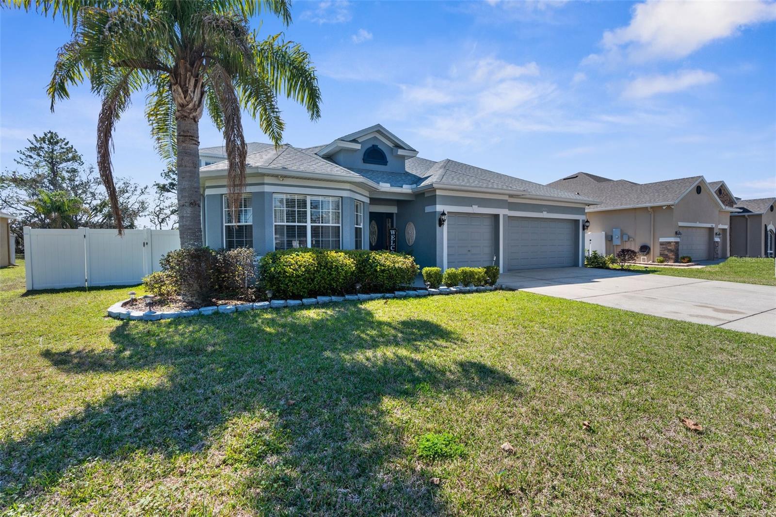 WOW! Photos do not even do this home justice, as gorgeous as they are! Tucked into the coveted Villages at Avalon, this fully renovated property has been detailed to the nines! Formerly a 3-bedroom, it now boasts 4 immaculate bedrooms and 3.5 baths! AND a bonus room and a media room in addition! Oversized driveway leads up to your 3-car garage! Fresh new look with exterior paint, new roof, 2 new AC systems, and all-new duct work throughout! Upon entering, you will love the natural lighting and open, spacious floor plan with a massive dining room/formal sitting room. Then, it opens up to a true chef's kitchen with gorgeous solid wood cabinets, granite countertops, dual ovens, a flat cooktop, and so much more. The beautiful living room separates the primary bedroom suite and the other two bedrooms on the first floor and opens to the incredible outdoor oasis and pool. The primary bedroom has gorgeous windows with that oasis view and a bathroom that will please everyone with a garden tub and separate oversized shower, secluded water closet, and dual sinks. Bedrooms 2 and 3 are separated by a "jack & jill" full bathroom with a new glass door completing that shower. No detail was overlooked downstairs, BUT WAIT UNTIL YOU SEE UPSTAIRS! Brand new luxury vinyl flooring will lead you up the stairs to the second level that includes a spacious media room and a separate 4th bedroom, and inside that bedroom is a half bath and a MASSIVE WALK-IN CLOSET. This second-level media room also has its own private balcony that's tiled and has an option for a covered awning or wide open if you prefer. Let's head back downstairs to that outdoor pool oasis! Brand new pump, saltwater system self cleaning HUGE heated pool and spa, brand new pavers surround patio and oversized fenced in yard with lighting, shed and sprinkler system! There are honestly more new features than the system allows characters in this write-up! So, let's schedule your showing today!