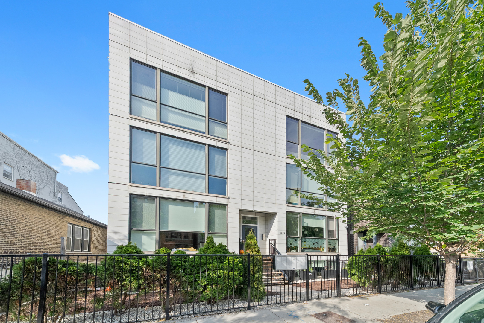 Welcome home to this stunning Bucktown 2Bed/2Bath newer construction PENTHOUSE with a bonus room and an expansive private rooftop deck-perfect for entertaining. From the moment you step inside, you're greeted with a spacious open floor plan. The gourmet kitchen features quartz countertops, a large island, custom cabinetry, and high-end Bosch appliances. The living room has 10-foot ceilings and oversized windows, filling the space with natural light and creating a warm, inviting atmosphere-ideal for both entertaining and quiet nights in. Throughout the home, you'll find beautiful hardwood floors and detailed custom trim work. The primary suite offers a spa-like retreat with heated floors, a steam shower with body sprays and a rain shower head and seperate tub. The second bedroom is perfect for guests or a home office. Step outside to your massive private rooftop deck that stretches from north to south with breathtaking skyline views, as well as a private terrace off the primary bedroom. The rooftop is fully equipped with a bar, pergola, and unique city views. Additional highlights include: New AC installed in July 2025, freshly painted in 2025, guest bedroom with electric fireplace, custom fireplace bench, and drapes, and one garage parking space plus ample street parking. Enjoy easy expressway access, the 606 trail, and just a short walk to Bucktown's vibrant restaurants and nightlife!