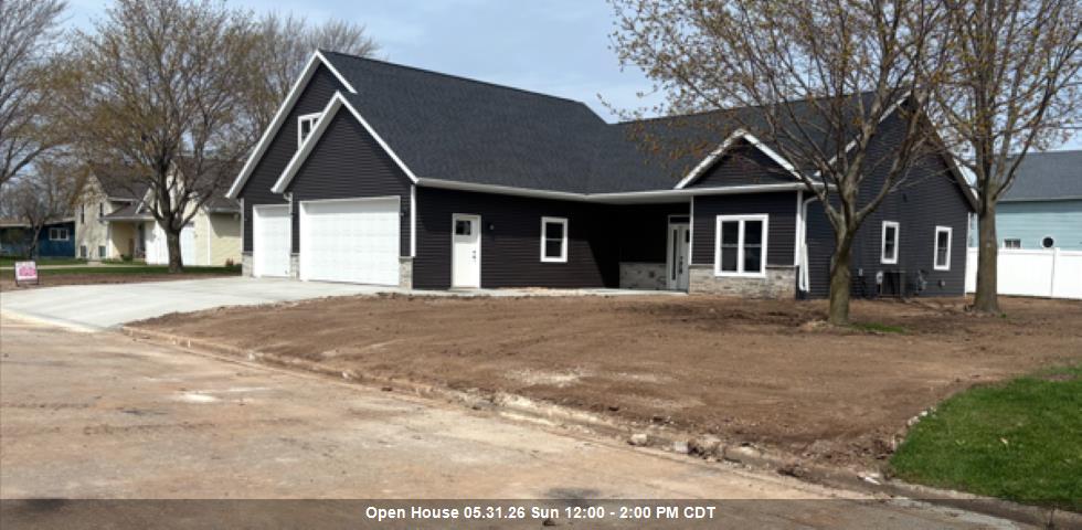 New Construction. Modern Ranch Living in Hilbert. Discover the great blend of modern luxury and thoughtful design in this stunning new construction ranch home located in Hilbert WI. This property combines high-end finishes with functional spaces designed for comfortable living. Interior excellence in the heart of the home features an open-concept layout accentuated by 9-foot ceilings that create an airy, expansive feel throughout. The gourmet kitchen is a true standout, boasting custom cabinetry and sleek hard-surface countertops. A large center island perfect for meal prep and dining. A dedicated main-floor laundry room for ultimate convenience with three spacious bedrooms and two full bathrooms. 3 car finished garage, covered patio, CA, front porch, New driveway included.