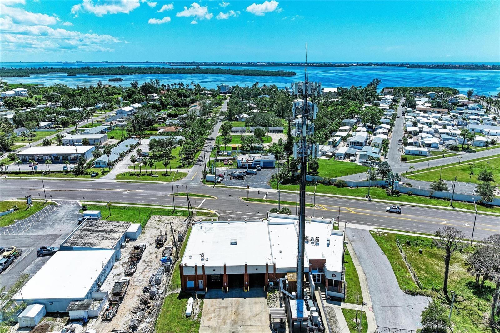 ***CREATIVE SELLER FINANCING ARRANGEMENT AVAILABLE PLEASE INQUIRE FOR MORE DETAILS***Don’t miss this rare opportunity to own a long standing auto repair business in a high-visibility location just two miles from Anna Maria Island. This poured concrete block building includes three service bays, two lifts (one an in-ground 1956 hydro lift), and sits on a corner, pie-shaped lot with ample parking and a 300 sq ft storage unit in the rear. Gas pumps previously on the property have been professionally removed, allowing for a clean slate and broad redevelopment possibilities. With a traffic count of approximately 33,000 vehicles each day and significantly along Cortez Road, the property offers excellent visibility and accessibility for a wide range of commercial uses.
The business has operated at this site for over 24 years. The current owner is retired and leasing to a longtime employee on a month to month basis. GC Zoning being able to provide for a variety of retail use and services in free standing parcels or shopping centers to serve the community general commercial needs. This district may also facilitate dwellings, multifamily residential, and mixed use including multi family residential.
Showings are listing accompanied and by appointment only evenings after 6 PM or weekends to avoid business disruption.
Located in a rapidly growing corridor of Manatee County, this commercial property offers exceptional future potential. With a year-round population of approximately 455,356 and significant seasonal fluctuations, the demand for services and infrastructure continues to rise. Just east of the property the highly anticipated Lake Flores / SeaFlower development is underway, The first phase of building out SeaFlower located west of 75th Street West and south of Cortez Road in Bradenton will include 1,700 residential units, 250 hotel rooms and 350,000 square feet of office and retail space. In all, it will bring 4,000 residential units and the mixed-use project will span 1,175 acres.

In addition Manatee County has approved changes to 358.5 acres north of Cortez Road W also known as peninsula bay to allow for the development of a mixed-use project that will include 1,950 residential units, 90,000 square feet of commercial space, storage space for 200 boats and a boat ramp and marina basin. The development, dubbed Peninsula Bay, will include a trail system offering access to the bay, the marina and a 60-acre internal lake, and the property will include 16 acres of parks, trails and native uplands, plus pocket parks. “The vision for Peninsula Bay is an eco-friendly waterfront fishing village and resort, building on the character of the Cortez community while integrating new vacation and living options.

Additional nearby developments include two new hotels under construction near 55th Street and Cortez Road (TownePlace Suites & Country Inn), bringing tourism and business travel to the corridor. Planned widening of 53rd Avenue W and new multi-use trails will further improve traffic flow and pedestrian access.
While construction timelines may vary based on builder pace, buyer demand, and market conditions, multiple builders are actively involved across nearby projects, solidifying this location as a future hub for commerce, hospitality, and community services.