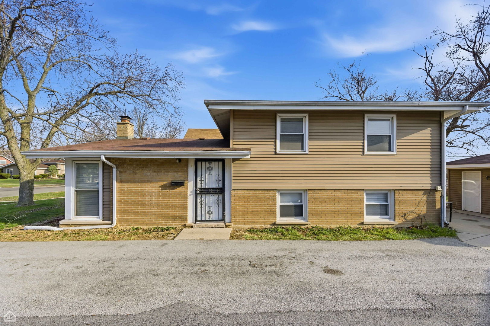 Welcome to this charming split-level home, offering both functionality and style! Featuring 3 bedrooms and 2 bathrooms, with versatile living spaces for work, study and play from home. As you enter, you'll be greeted by luxury vinyl flooring and hardwood floors that flow throughout the main living areas. The freshly painted walls create a bright and inviting atmosphere, while the newer kitchen is designed for both cooking and entertaining, boasting modern appliances and ample storage. The split-level design allows for distinct living areas, providing privacy and space for everyone. Enjoy the convenience of a long asphalt driveway leading to a 2-car garage, perfect for parking and additional storage needs. The back yard offers plenty of room for outdoor activities, gardening, or simply relaxing in your own private oasis. This home combines comfort and style, making it a must-see! Schedule your showing today and discover all the wonderful features this split-level home has to offer!