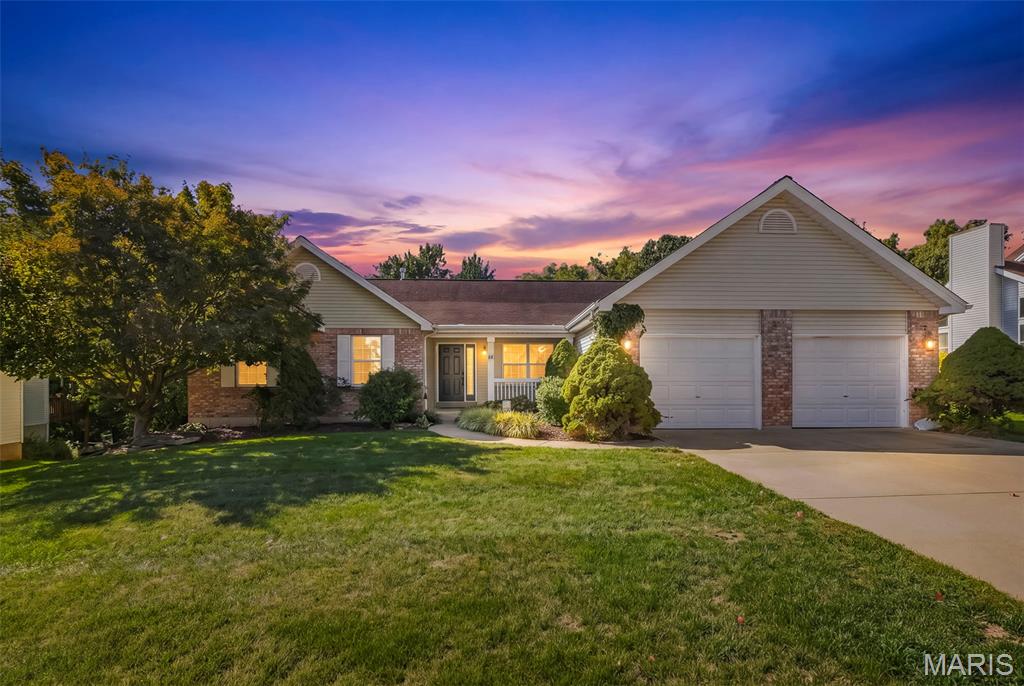 Welcome home to this wonderful sprawling ranch home with 3,000 finished sqft set on a beautiful wooded lot in the desirable Briarwick neighborhood. This one way in, one way out neighborhood is filled with long time owners. The opportunity for an available property in this community is rare! You are welcomed into the front entry way open to the vaulted great room featuring a brick surround gas fireplace & laminate flooring throughout. The formal dining room sits between the front entry and kitchen creating a perfect setting for entertaining friends and family this coming holiday season. Kitchen features 42 inch oak cabinetry, quartz countertops, tiled backsplash, plantation shutters, pantry, mostly stainless steel appliances including refrigerator and gas range. The high top breakfast bar connects to the breakfast room. Head out onto the back deck which overlooks the wooded yard, a picturesque spot to enjoy your morning coffee. Main floor laundry is off the kitchen leading to the garage. Primary bedroom suite offers an expansive bedroom with vaulted ceiling, large walk-in closest, dual vanity, ceramic tile floors, and large onyx shower enclosure. on suite bathroom is spacious enough to add a soaking tub if you desire. Two more generously sized bedrooms and full hall bath. The walk-out lower level features a mud room back entry, large family room, 3rd full bath and a 4th bedroom with expansive walk-in closet. The unfinished area of the basement is perfect for a workshop or hobby room offering tons of storage space. The oversized 25 x 23 two car garage features a service door leading to the fenced back yard. Architectural shingle roof, central vacuum system, High efficiency HVAC, and hot water heater. (2021). Great location with easy access to highways 364 & 70 plus shopping and dinning options. Schedule your private showing today!