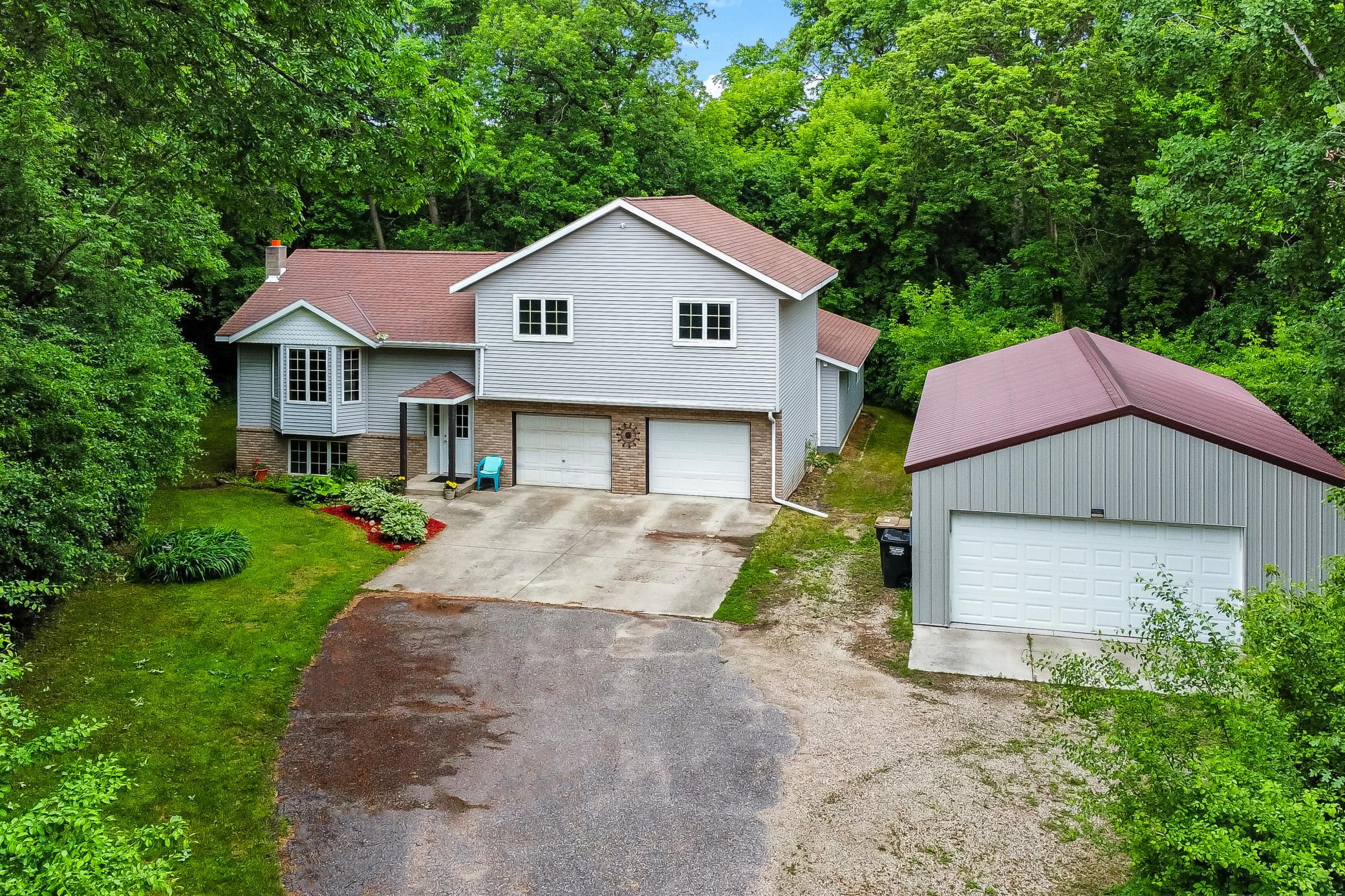 Opportunities abound with this versatile property! Resting in a peaceful country setting just minutes from town, this 4-bedroom, 4-bathroom home offers space, flexibility, and recent updates throughout. Originally built as a 3-bedroom, 3-bathroom home, a private in-law suite was added in 2018, along with a 24' x 40' detached shed featuring electricity and a full concrete floor.Recent improvements, including the deck, shingles, gutters, air conditioner, and washing machine, make this home truly move-in ready. The in-law suite provides excellent potential for multi-generational living, rental income, or a private home office. Don't miss your opportunity to own this well-maintained home in the desirable Heatherwood neighborhood—schedule your private showing today!