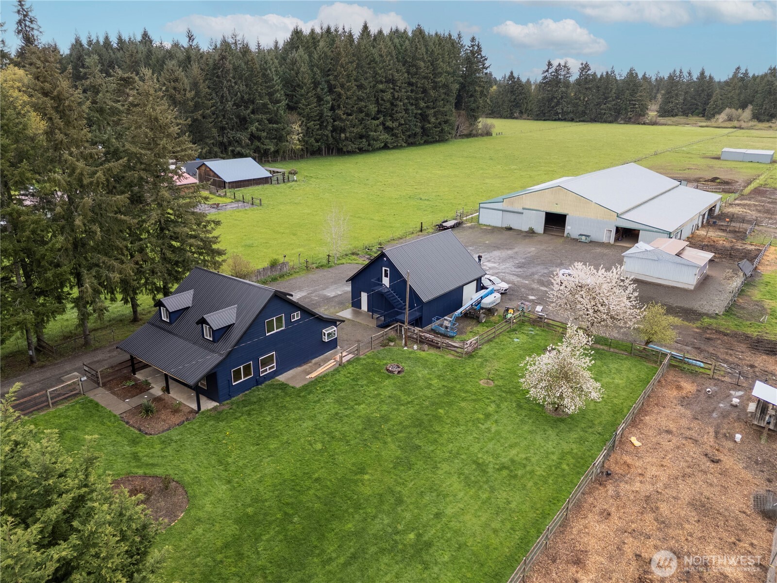 Welcome to an Exceptional Equestrian Property situated on 11.84 acres in Toledo Wa. This Horse Training Facility offers a Rare opportunity for both the Dedicated Equestrians &/or those seeking a Peaceful Rural Lifestyle. You're Greeted by the Country Style 3-Bedroom, 3-Bath Home w/ Fenced Yard, Garden Space & Chicken Coop. The 30x36 Shop w/ 3 Garage Bays supply's room for Vehicles, Equipment, or just extra Storage.  Above the Shop, you’ll find fully functional Separate Living Quarters ideal for Trainers, Guests, or Potential Rental Income. The Equestrian Facility is thoughtfully Designed w/ the needs of Horse Owners & Trainers in mind. Featuring 16 Well-Constructed Stalls, & Dedicated Wash Station for Easy Grooming along w/ several covered Outbuildings. Currently Accommodating both Self-Care & Full-Care Boarding Operations. Each stall prioritizes Safety, Ventilation, & Comfort to ensure a Healthy Environment for your Horses. The Impressive 11,760 sq ft Indoor Riding Arena allows for Year-round Training & Riding, no matter the Weather! Envision running YOUR OWN Professional Training Operation, Boarding Facility, or simply Enjoying your Horses at home, this Property offers Endless Potential! Whether you’re Conducting Lessons, Training Competitively, or Enjoying a Casual Ride, this Expansive space delivers unmatched Versatility! Watch the Video Tour!