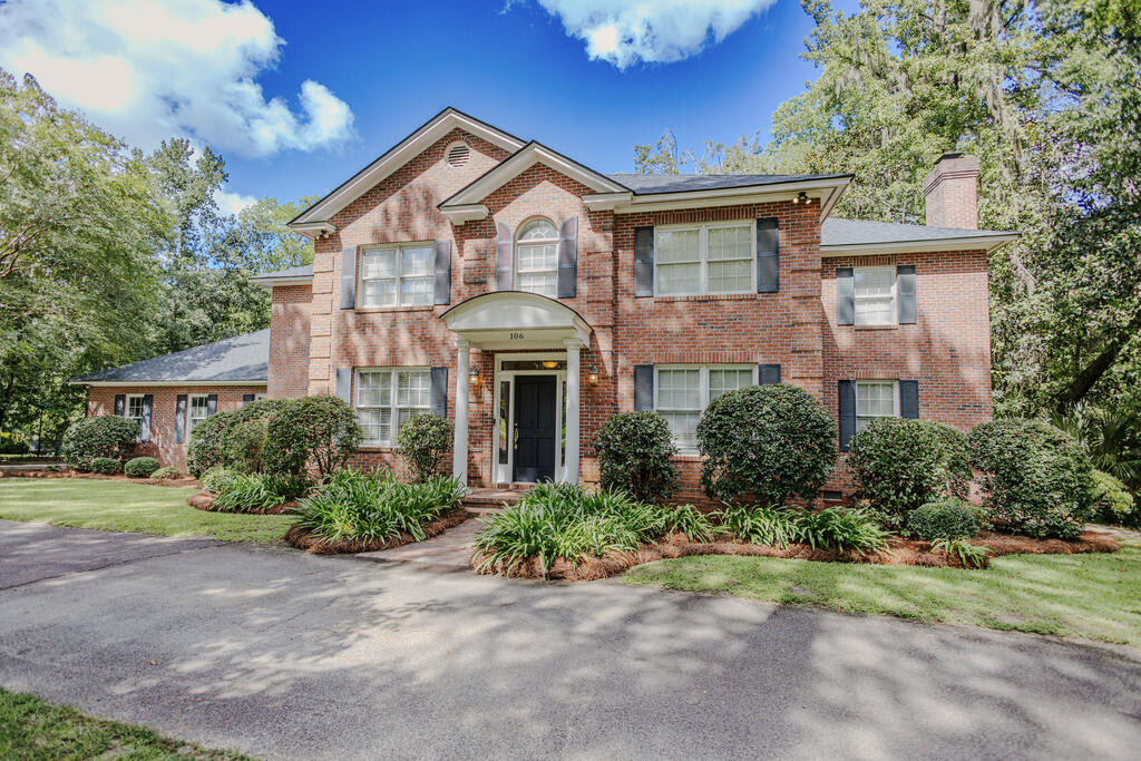 Classic brick Colonial offering 3,627 square feet, 4 bedrooms, and 3.5 baths on 1.28 acres in the desirable Place in the Woods neighborhood. From the moment you enter, this home makes an impression with a beautiful foyer, an elegant staircase with a curved wood banister, arched openings, and hardwood floors throughout. The main level offers a formal dining room and formal living room that could easily serve as a home office, along with an open and spacious family room featuring a soaring two-story ceiling, fireplace, and built-in bookcases. The family room flows seamlessly into the large kitchen and breakfast area, creating a wonderful space for everyday living and entertaining. The kitchen offers abundant cabinetry and counter space, a large island with bar seating, and a walk-in pantry. Also on the main floor is the spacious primary suite with its own fireplace and large walk-in closet. A generously sized laundry room off the garage includes a utility sink and built-in desk, and a convenient half bath completes the main level.  Upstairs, one bedroom features a private en suite bath, while two additional bedrooms share an exceptionally spacious Jack-and-Jill bath. A flexible additional room with its own private staircase from the kitchen can serve as a fourth upstairs bedroom, bonus room, home office, or exercise room. Outside, enjoy the privacy and space of the 1.28-acre lot with a large deck and fenced backyard. A two-car garage provides additional storage and convenience. All of this in a sought-after neighborhood just minutes from downtown Thomasville with easy access to Tallahassee.