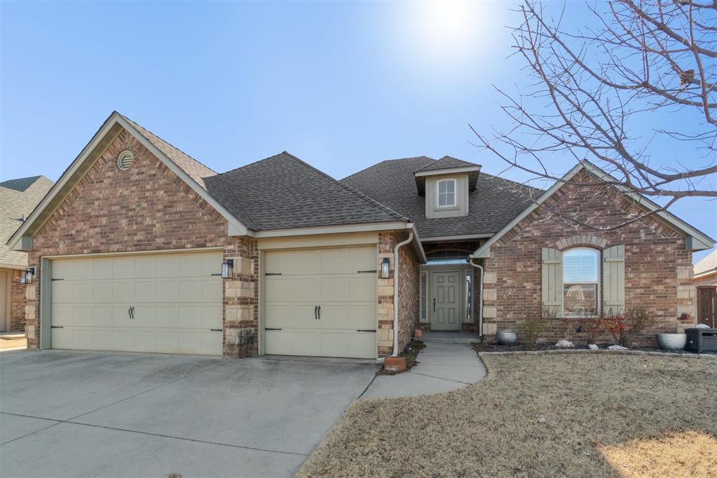 DEER CREEK SCHOOLS! NEW ROOF COMING SOON! Experience comfort and style in this spacious home offering 4 bedrooms, 2 full bathrooms, a 3-car garage, and a versatile upstairs bonus room—ideal for a home theater, game room, or additional storage, with convenient walk-out attic access. The fourth bedroom provides flexibility and can easily serve as a home office or flex space.Enjoy cozy evenings by the living room fireplace or entertain effortlessly in the open-concept layout that seamlessly connects the kitchen, dining nook, and living area. Recent updates include fresh paint and new carpet upstairs. The kitchen features abundant storage and sleek stainless-steel appliances.Unwind in the luxurious primary suite, complete with dual sinks, a relaxing soaker tub, and a walk-in shower. A brand-new roof is coming soon, adding even more value and peace of mind.Located in the secure and highly desirable gated community Rosewood Estates Addition, this home offers access to a neighborhood pool, clubhouse, and playground, all within the award-winning Deer Creek School District. This home truly blends elegance, convenience, and privacy—don’t miss it!