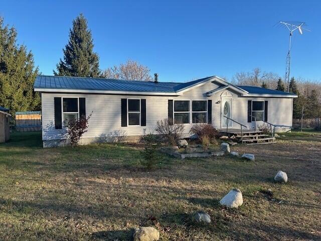 If you're looking for room to roam and an ideal start to a hobby farm this could be for you! Sitting on just under 8 acres of open and wooded acres butting up to state land! The north side has the cedar creek along it, and it winds back into the state land where you can enjoy recreational activities, peace and quiet. Included is a pole style barn used for cows and pigs. 2 already set up newer chicken coops and a tool shed. A large garden for growing much of your own produce! Home was partly remodeled and just needs some flooring and paint and a few smaller items to be a perfect homestead or first home! Schedule your showing today!