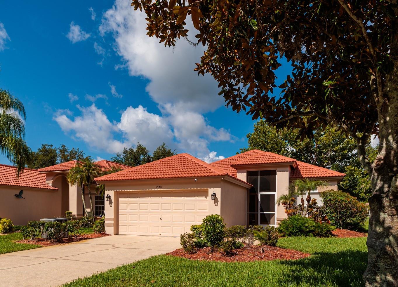 Beautiful sunsets await you. Welcome to this beautifully maintained 3-bedroom, 2-bath home offering 1,983 square feet of comfortable living space in one of the area's most desirable guard-gated golf course communities. Perfectly situated with tranquil pond views, this home provides the ideal blend of privacy, scenic beauty, and resort-style living.The spacious floor plan features generous living and entertaining areas, a two-car garage, and a layout designed for both everyday comfort and hosting family and friends. Relax on your lanai while enjoying peaceful water views or take advantage of the community's golf cart-friendly streets for easy access to neighborhood amenities and the golf course. Located within a highly sought-after community featuring A-rated schools, this home offers exceptional convenience for families while providing the security and peace of mind of a guarded, gated entrance. Whether you're looking for an active lifestyle or a serene place to call home, this property delivers the best of both.Don't miss this opportunity to own a beautiful home in a premier golf course community where outstanding schools, scenic surroundings, and exceptional amenities come together to create the perfect Florida lifestyle.  Come make it all yours. Call for a private showing today.