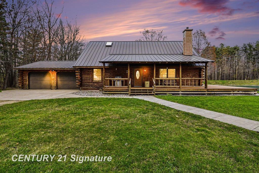 Enjoy the peaceful "up north" feeling without the long drive! This charming property offers the perfect blend of privacy, space, and functionality on 6 beautiful acres. Featuring 3 bedrooms and 2 full baths. The living room features a wood burner to keep you cozy during the winter months. Step outside and take in everything this property has to offer - a stocked pond ideal for fishing or quiet evenings by the water, a large deck perfect for entertaining or enjoying all of the wildlife.  For those needing extra space, you'll appreciate the impressive 30x40 pole barn with electricity and the option to add heat, along with a 30x18 covered storage shed for additional equipment or toys. There's even a dog kennel with electricity, making this a great setup for animal lovers or hobbyists. Whether you're looking for a peaceful retreat or just more room to spread out, this property delivers the best of everything.  Call today for your personal showing!