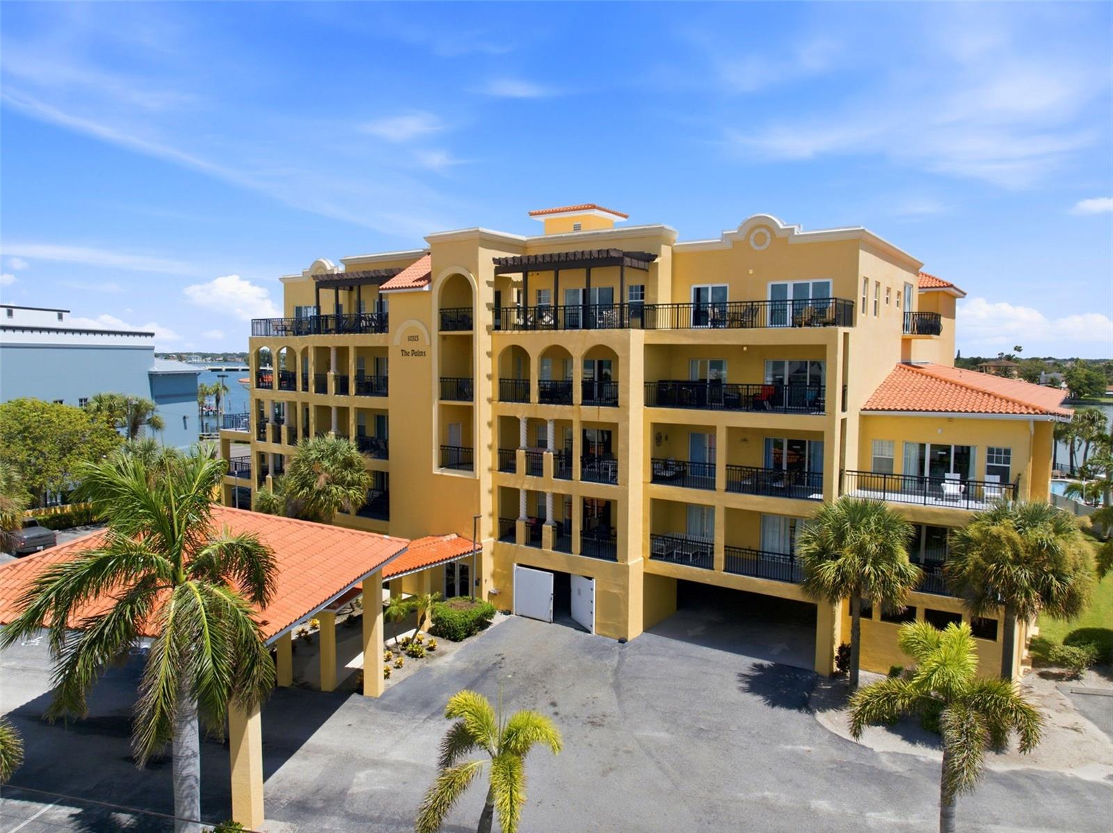 UNIQUE UNPARALLELED OPPORTUNITY!! HIGH OCCUPANCY RATE...  Check out this GORGEOUS FULLY FURNISHED/NEWLY UPDATED 1170 SF, 2 Master Suites with 2 Full Bathrooms and dual balconies; in one of the best locations in TREASURE ISLAND BEACH, FLORIDA.  The moment you enter into the main open floor living space you feel the coastal vibe of the Island, realizing you are literally a 2 minute walk to the sugar sands of the Gulf and just minutes to all the entertainment you can possibly desire.  The open floor plan offers a large kitchen and dining space with granite counter tops, plenty of cabinetry/storage space, stainless steal appliances, an in-unit washer and dryer for your laundry needs, as well as, a massive living area to entertain family and friends. Imagine hanging out in the resort style pool/spa and BBQ out by the pool while enjoying the views of the intracoastal waterway or maybe even a little fishing on the private dock. Sit out front on your deep private balcony while enjoying that evening beverage and taking in the breathtaking sunsets and what Mother Nature has to offer.  This rare/golden opportunity offers the finest in a CONDO/HOTEL and is located on the wide open Intra-Coastal waterway.  The Island is known for its crystal-clear waters, beaches, sunsets, fishing, boating, unique restaurants and shops, venues with live music and easy access to the infamous John's Pass Boardwalk and of course, Downtown St. Petersburg and the St Pete Pier.  A/C 2022 & Hot Water Heater 2023. EXCELLENT investment opportunity allowing SHORT TERM LEASING!