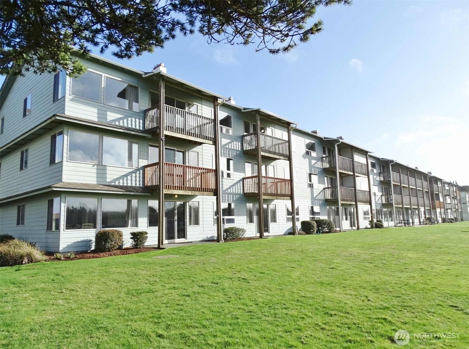 OCEAN/DUNES Front HOTEL Condo! 1st-floor CORNER UNIT (#113) in the Canterbury Inn in Downtown Ocean Shores. Relax in this Beautifully Updated & Decorated, Fully-Furnished, 2 BD, 1.5 BA, 980sf Condo. Comfortable Living Room w/ Propane Fireplace and a slider to the Private Front Patio. Dining Area w/ slider to the Rear Patio. Fully-equipped Kitchen w/ Eating Bar, Laminate Flooring, SS Appliances, dishes, etc. Ran as a Hotel, so NO HOA Dues. Owners can stay up to 2 WEEKS/YR + up to 4-6 additional days. The Canterbury Inn offers a heated indoor pool, hot tub, exercise room, social room, outdoor dog area, backyard lawn area & patio, and a 24-hr front desk. Recent Upgrades to the building: siding replaced & painted. Property backs the Dunes Area.