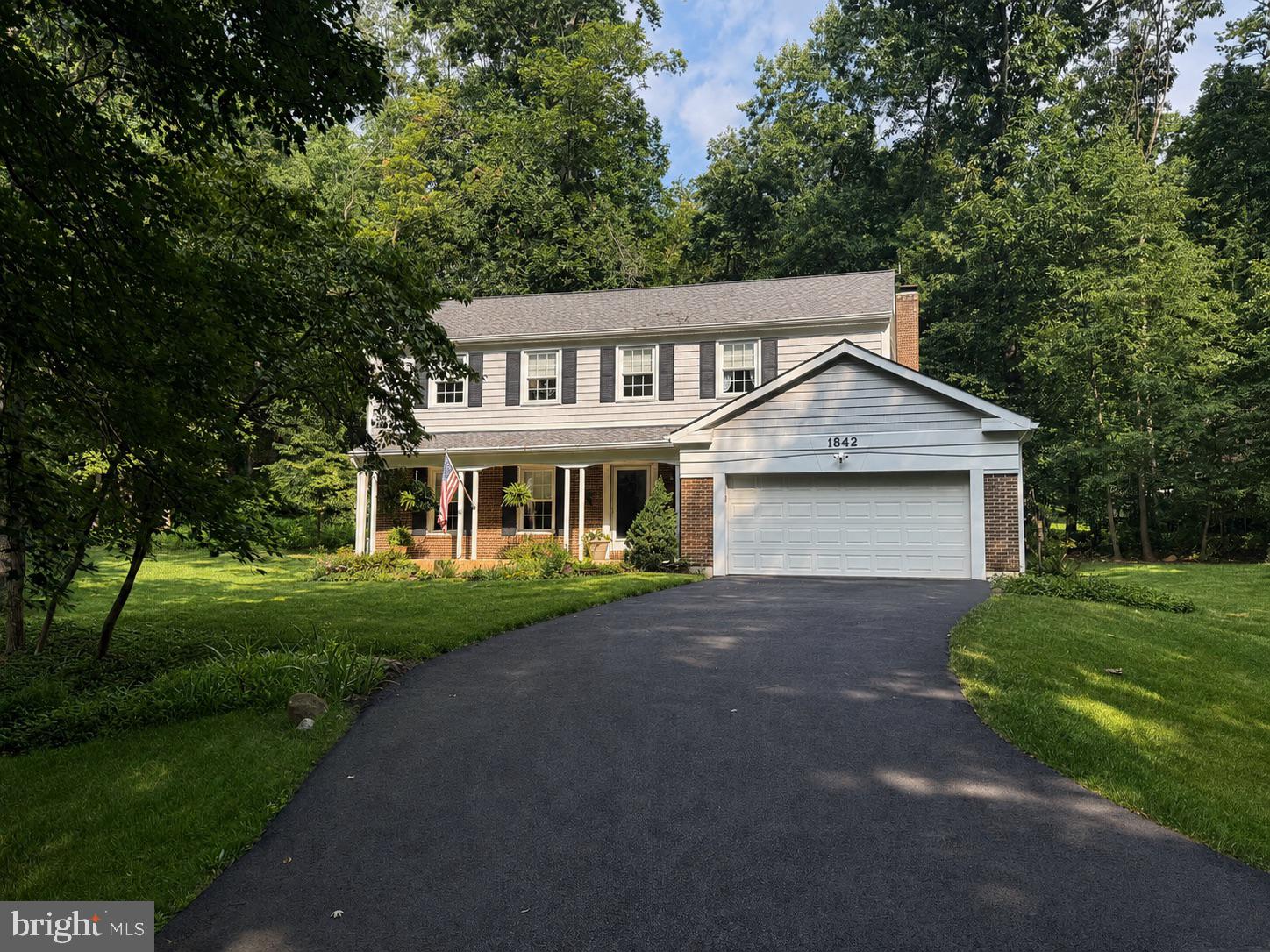 Open House Weekend - Saturday 1-3 pm and Sunday 2-4 pm! Stop by and grab a dirty soda or iced coffee! Welcome to this classic Reston colonial tucked away on a wooded pipe stem—offering a rare lot this close to everything. The traditional center-hall layout flows seamlessly into a sun-drenched sunroom addition, perfect for morning coffee. The kitchen features quartz counters and opens to the main living areas, while the updated primary bath adds a touch of polish. A 2-car garage and full unfinished basement offer serious storage and unlimited finishing potential. Major systems have been updated, so the next owners can simply move in and enjoy. Outside, mature trees frame the property, and the landscaped lot delivers natural privacy without sacrificing convenience. Just 2 miles to Wiehle-Reston East Silver Line Metro, minutes to the Dulles Toll Road (Rt. 267), approximately 10 minutes to Tysons Corner and I-495, and centrally located among the region's top employers — Google, Microsoft, Oracle, SAIC, Leidos, and General Dynamics all call this corridor home. Zoned for Sunrise Valley Elementary and Langston Hughes Middle — both offering the Advanced Academic Program (AAP) — and South Lakes High School. Reston Association amenities include 15 pools, 55+ miles of trails, tennis, pickleball, and a vibrant Town Center just minutes away. Roof 2024. HVAC 2023. Water Heater 2022. Updated electric panel. Sunroom addition (not temperature-controlled). Updated windows.