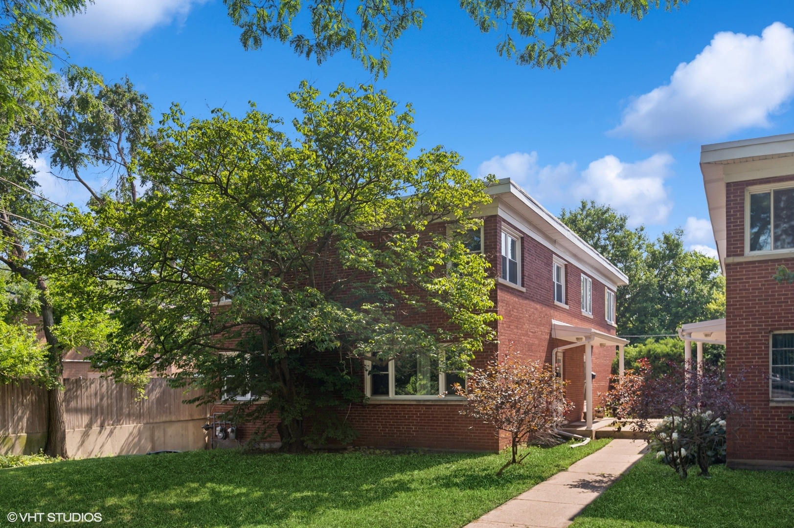 Beautiful 3-bedroom, 2.5-bath townhome now available in northwest Evanston. As you walk inside you find a large, open-concept living and dining area, featuring hardwood floors that run throughout the main and second levels. The updated kitchen boasts quartz countertops and matching GE Slate appliances. A sleek powder room completes the main floor. Upstairs, you'll find three comfortable bedrooms, each with a ceiling fan, including a spacious primary suite with a double closet. A full bathroom also serves this level. The expansive walkout basement offers tremendous flexibility-ideal for a family room, home gym, office, or even a fourth bedroom. This level also includes another full bathroom and a laundry area for added convenience. To top it off, this property is just steps from the CTA 201 bus, providing direct service to Northwestern University, downtown Evanston and the Central Street Metra station. With its thoughtful layout, nice updates, and unbeatable location, this home is the perfect blend of comfort and convenience. Come see it before it's gone!