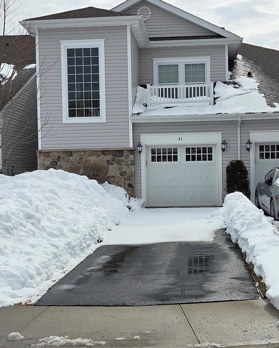 Built in 2022, this condo has all the modern features, including your own private elevator! This condo offers a dining area, Living Room and  Eat in kitchen. The primary en-suite features a generously sized primary bath and 2 walk-in closets. Guest quarters offer a full guest bath and bedroom with a double closet. Laundry in unit.  Upgrades include, but are not limited to:Cabinets, sink, refrigerator, plunbing, flooring, crown molding, hi hats, etc. The bonus room is fully finished for your needs. One car garage and a driveway for 2 cars! All of this right in the cul de sac! Utilize the extra parking for your guests. No through traffic. This is the one you've been waiting for!!Heated Pool, Whirlpool, Bocce Courts, Putting Green, Lake with Row & Paddle Boats, Gazebo with Beautiful Walking Trails. Our Stunning Clubhouse Includes Life Fitness Center, Game Rooms, Great Room, Bar & Kitchen Facilities, Gas Fireplace