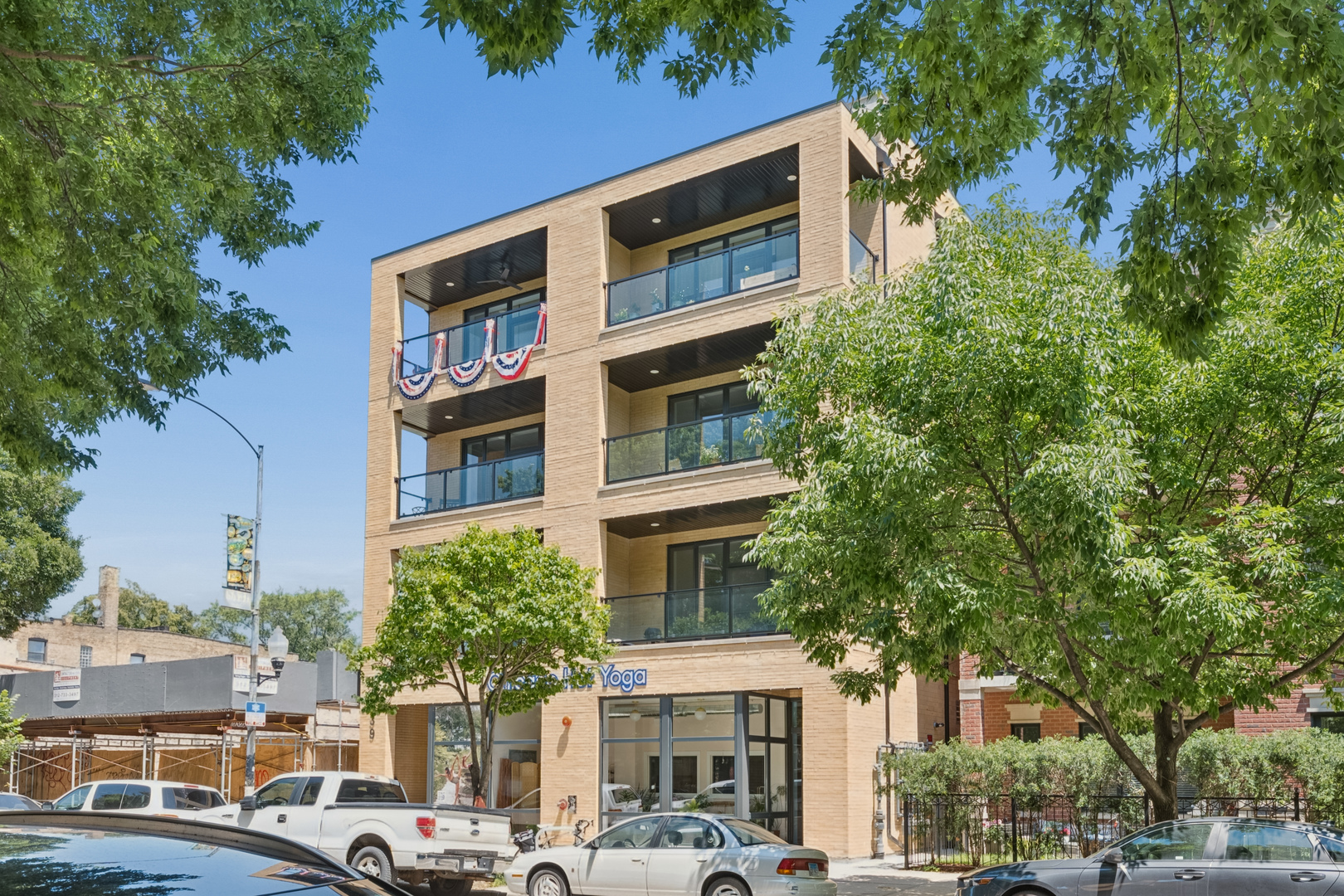 Experience elevated living in this beautifully designed 2-bedroom, 2-bath residence in a boutique elevator building in the heart of Ravenswood. Offering the perfect blend of luxury, convenience, and thoughtful design, this newer construction home features an open-concept floor plan with wide-plank oak hardwood floors, oversized windows that flood the space with natural light, and a stunning chef's kitchen complete with stainless steel appliances, quartz countertops, custom cabinetry, and a large island ideal for entertaining. The spacious primary suite offers a spa-inspired bath with a double vanity and oversized walk-in shower, while the generous second bedroom provides flexibility for guests or a home office. Enjoy seamless indoor-outdoor living with a private terrace plus your own expansive rooftop deck-perfect for relaxing, grilling, or taking in the neighborhood views.  Additional highlights include in-unit laundry, custom closet organizers, attached heated garage parking, elevator access, and low-maintenance living. Ideally located just steps from Winnemac Park and moments from Lincoln Square, Andersonville, North Center, and Ravenswood's vibrant restaurants, coffee shops, boutiques, Metra, Brown Line, and Mariano's. This is modern city living at its finest in one of Chicago's most sought-after neighborhoods.
