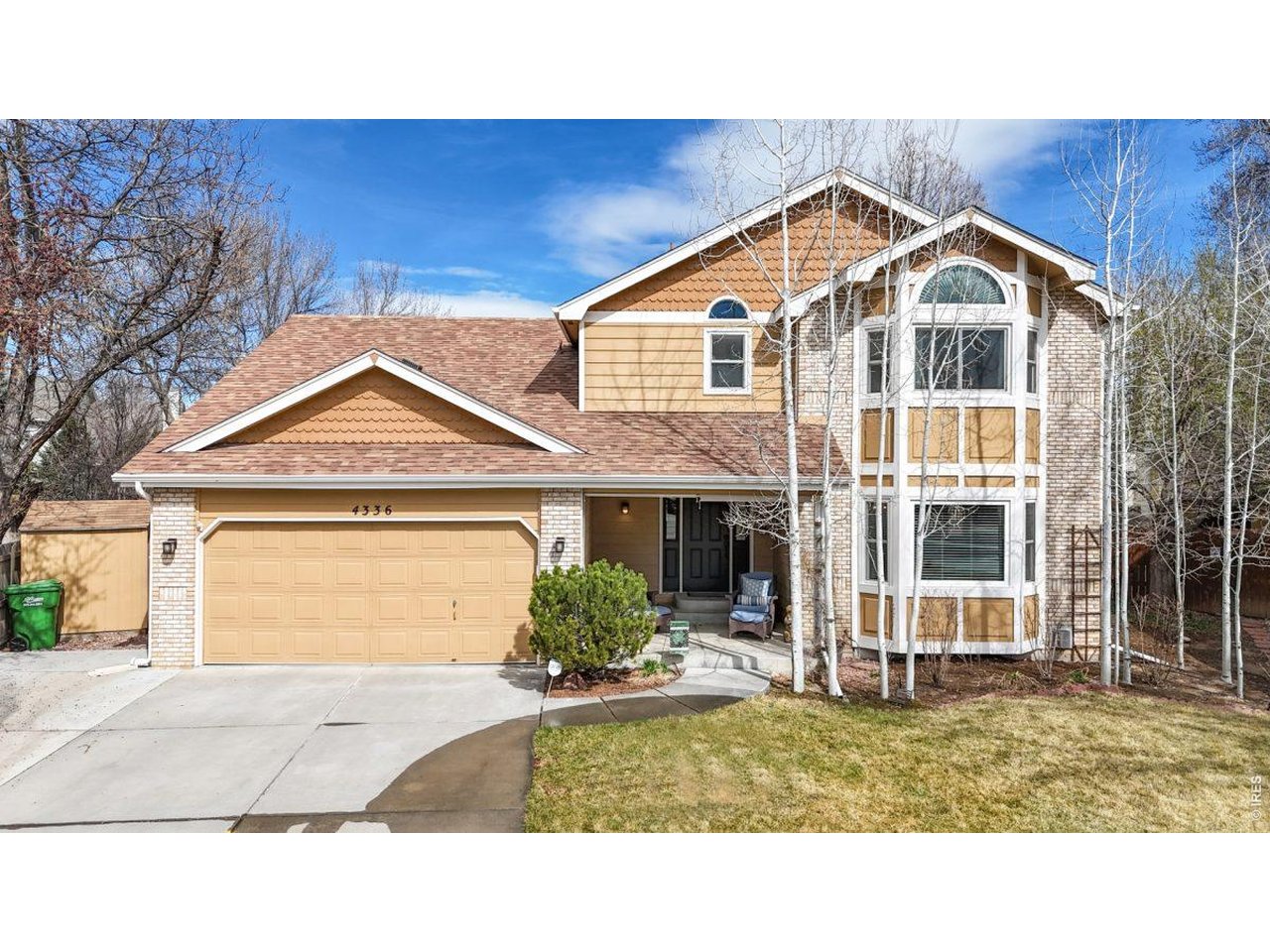 Welcome home to Golden Meadows. Located centrally in Fort Collins, this 2 story home features 5 bedrooms, an office, living room, dining room, and large rec room. Walk up to the front patio which features ample space for seating and a pull down sunshade so you can enjoy the space any time of day. Inside you're greeted with a built in bench that also provides additional storage, and a large, bright living room and dining room. The kitchen, with *2* pantries, flows into another dining area and family room with a gas fireplace and vaulted ceiling. Upstairs, the primary bedroom is spacious and features an attached 5 piece bath and walk in closet. Upstairs there are 3 more bedrooms, spacious enough for any use, office, workout rooms, game room, etc. In the basement you have another large living space, perfect for watching movie, game night, or just relaxing. You have a quiet office area with extra storage and another oversized bedroom with a walk in closet. The backyard has been landscaped to make it the perfect retreat with an extended patio, large trees for privacy and garden beds that are perfect for your veggies or beautiful flowers. Enjoy beautiful upgrades and unique touches throughout the home like the beautiful wallpaper in the living and dining room and the custom paneling on the ceiling in the family room and the primary bedroom. This home has so much to offer, stop by and see what makes it perfect for you!
