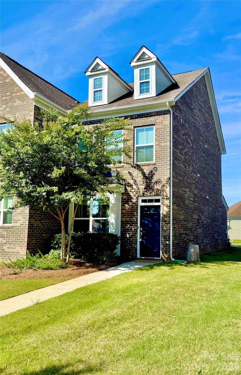 Experience elevated low-maintenance living in this executive end-unit townhome located in the highly sought-after Rea Farms community. Home is fully furnished and beautifully decorated, spacious and thoughtfully updated. This home features 2 bedrooms, 2.5 bathrooms, and a versatile loft—perfect for a home office, media space, or guest retreat.The open-concept main level showcases upgraded hardwood flooring, custom crown molding and trim, upgraded baseboards, designer feature walls, and abundant natural light. The kitchen is equipped with stainless steel appliances, a gas range, updated cabinet hardware, and a Kohler faucet, creating a stylish and functional space for everyday living or entertaining.Upstairs, both generously sized bedrooms offer private ensuite bathrooms and walk-in closets. Recent improvements include FRESH INTERIOR PAINT, BRAND NEW CARPET, a fully remodeled powder room with Kohler fixtures, updated lighting throughout, and custom window treatments.Step outside to enjoy the private patio space, extended driveway, and desirable cul-de-sac location. Additional features include a one-car detached garage, brick exterior, and an in-ground irrigation system maintained by the HOA.Enjoy unmatched convenience with walkability to premier dining, shopping, Life Time Fitness, and quick access to I-485 and Highway 16. This turnkey opportunity combines luxury, comfort, and an exceptional location in one of South Charlotte’s most desirable communities.