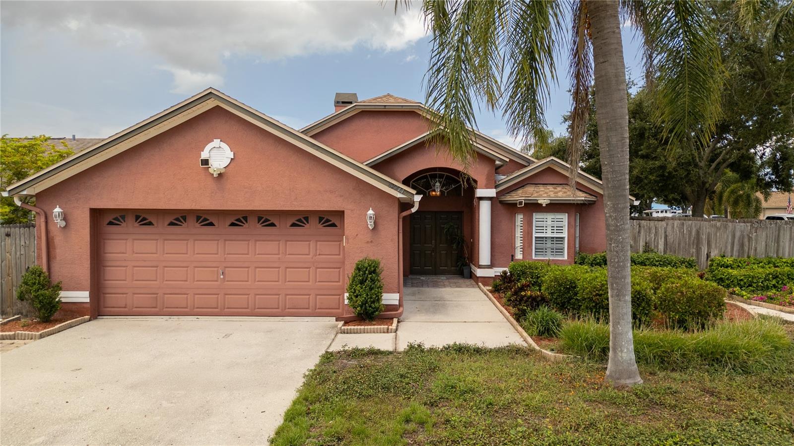 Welcome to Pine Forest, one of the area’s best-kept private enclave neighborhoods where pride of ownership is on full display. With only a limited number of manicured homes, this hidden gem offers the perfect balance of peace, privacy, and convenience.

From the moment you step through the grand double doors, you’ll be greeted by soaring cathedral ceilings, radiant natural light, and elegant tile flooring. The spacious living room centers around a custom hardwood built-in entertainment wall with a warm wood-burning fireplace—perfect for both cozy nights in and stylish entertaining.

The completely remodeled kitchen is a chef’s dream featuring gorgeous stone countertops, custom 42-inch hardwood cabinetry, and sleek stainless steel appliances. Entertaining is effortless with a high-top bar, stainless sink, and a dining area that opens seamlessly to both the living room and pool area.

Your master retreat is a private oasis of relaxation with vaulted ceilings, a stunning pool view, and a spa-inspired bathroom offering a dual-sink vanity, jacuzzi tub, and independent walk-in shower.

Step through the French doors to your screen-enclosed tropical paradise, complete with a sparkling pool, waterfall feature, and ample patio space designed for year-round enjoyment. The ambiance is simply incredible—whether you’re hosting friends or enjoying a peaceful morning by the water.

Additional upgrades include:

Newer HVAC system

High-performance water heater

Brand-new pool equipment

Sitting proudly on a corner lot, there’s even space to park your weekend toys. And the best part? This home is located in a NO FLOOD ZONE!

All this while being just minutes from some of the nation’s top beaches, vibrant dining, and the area’s most popular hot spots.

This home truly captures the Florida lifestyle you’ve always dreamed of.