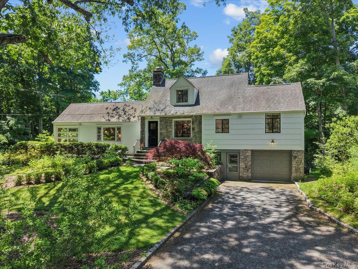 Nestled on a charming cul-de-sac in one of Mount Kisco’s most convenient locations, this pristine and impeccably maintained Cape offers timeless appeal and effortless living. Just minutes from downtown, Metro-North, shopping, dining, and major highways, the home combines tranquility with everyday convenience.Warm and inviting, this residence has been lovingly cared for and is ready for its next chapter. Step onto the rear deck and unwind while taking in distant western sunsets that paint the evening sky, creating the perfect backdrop for relaxing or entertaining. Whether you’re enjoying the peaceful setting at home or the easy access to the village and beyond, 51 Laurel Drive is the perfect place to call home. A rare opportunity where comfort, charm, scenic beauty, and accessibility come together.