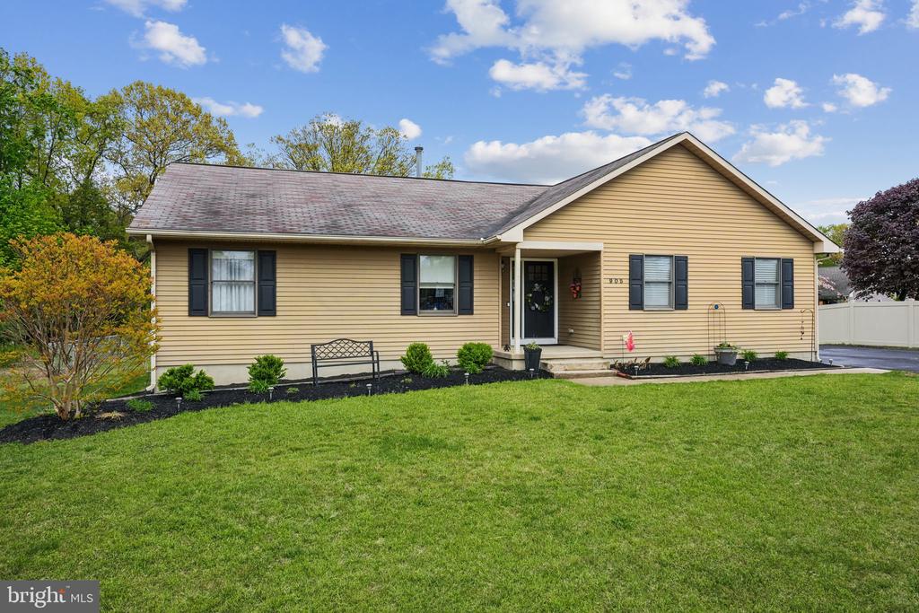 Looks can be deceiving!  Remarkably spacious and beautifully updated 3 bedroom, 2 full bath rancher with huge finished full basement and 2 car side entry garage!  Former model home by custom builder James Jordan with many quality updates and amenities throughout.  Lovely covered entry leads to the charming foyer with easy care luxury vinyl plank flooring that flows throughout the main level.  Generous living and dining rooms, perfect for gatherings with family and friends.  French doors off the dining room lead to a wonderful 28 x 10 deck that overlooks the .35/acre yard with 24 foot round above ground pool (approximately 6 years old).   Updated kitchen with white painted cabinetry, granite countertops, tile backsplash and stainless appliances, all to remain.  Very spacious bedrooms with fantastic closet space plus 3 additional closets in the hallway.  Primary bedroom with ceiling fan and huge walk-in, also features a beautiful primary bath with shower, recessed lighting, ceramic tile flooring and white vanity with granite counter.  The wall cabinet and shelving remain.  The updated hallway bath, also with granite counter vanity, recessed lighting, wall cabinet and tiled floors offers a tub and services the secondary bedrooms.   Fabulous finished basement offers a tremendous amount of additional living space as well as a utility room with lots of additional storage space.  Additional features include gas heat and central air (both approximately 4 years old),  hot water  heater (approximately 5 years old), neutral paint throughout, 2 car side entry garage with insulated door and garage door opener, large asphalt driveway  for plenty of parking, Andersen windows throughout, Craftsman style front door with side lite, large back yard with well for irrigation, security system, chair rail moldings, ceiling fans, recessed lighting, six panel doors, main floor laundry with Whirlpool front loading washer and dryer to remain.  A fantastic opportunity to make this your dream home!!