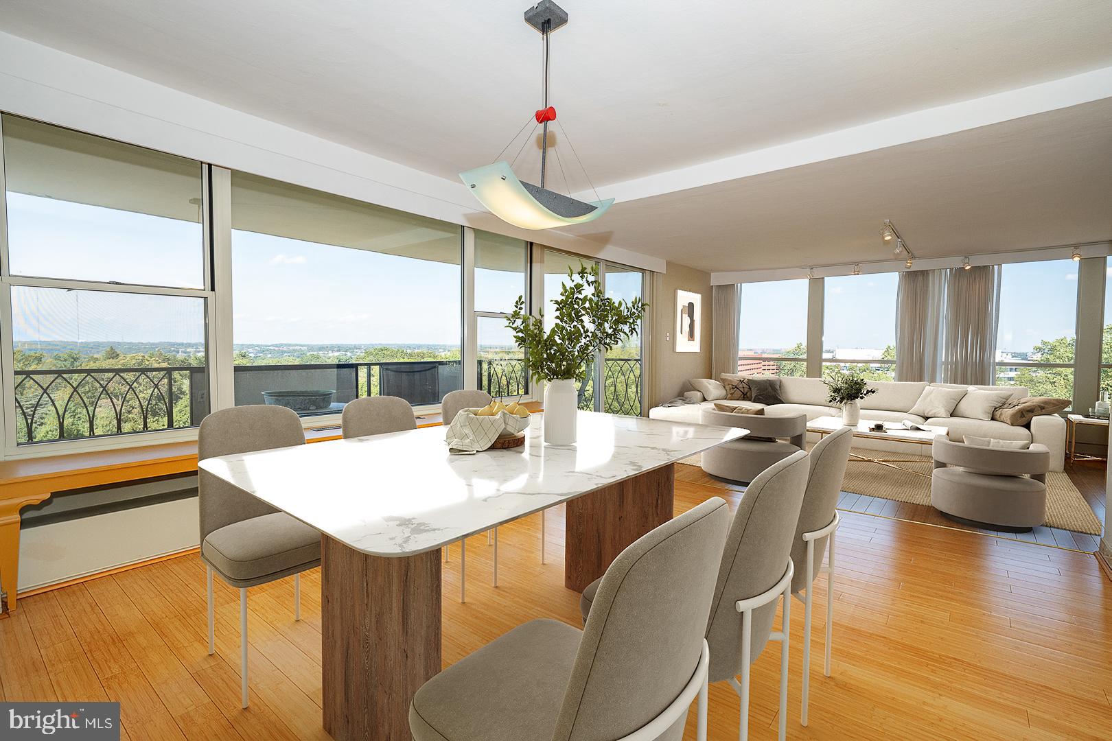 Welcome to this spacious 2 Bedroom, 2.5 Bath corner unit with 1,971 sq ft of living space at the highly desirable Sutton Terrace. Originally a 3-bedroom layout, this home has been thoughtfully converted to maximize open space and functionality. A bright foyer opens to an expansive living and dining area featuring bamboo floors and sweeping views from walls of windows. Sliding glass doors lead to a large private balcony, perfect for fresh air and outdoor dining. The updated kitchen boasts granite countertops, stainless steel appliances, abundant cabinetry, and a cozy breakfast area. Just off the living space is a versatile bedroom with pocket doors—ideal as a den or home office. The luxurious primary suite offers a walk-in closet/dressing area and a spa-like ensuite with dual vanities and a soaking tub. An additional full bath, a powder room, in-unit laundry, and plenty of storage complete this exceptional home. Sutton Terrace is a prestigious doorman building with on-site maintenance and outstanding amenities including a complete fitness center, beautifully landscaped pool with cabanas, barbecue and patio areas, and tennis courts. The monthly fee conveniently covers most utilities. All of this within the award-winning Lower Merion School District, with a fabulous walk-to-everything location—just steps to the train and minutes to I-76 and Center City.