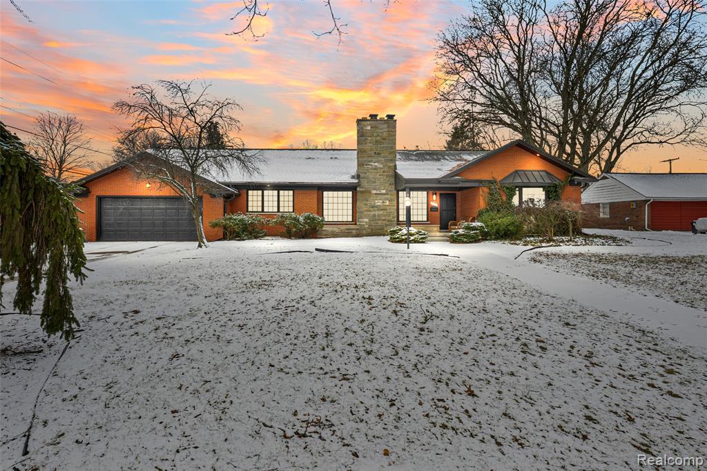 Welcome to this beautifully remodeled & exceptionally spacious ranch home situated on a generous 0.40-acre lot in one of the most desirable areas of Dearborn. Offering approx. 5,900 square feet of refined living space, this remarkable 6-bedroom, 6-bathroom residence blends timeless elegance with everyday comfort.Home features stunning wood flooring throughout, complemented by crisp white doors, and detailed moldings. The modern white kitchen serves as the heart of the home, complete with custom cabinetry, an oversized island & striking countertop. The kitchen opens to a warm & inviting family room, perfect for gathering and entertaining, in addition to separate formal dining room with direct access to the expansive backyard.It offers 2 luxurious primary suites. The first-floor primary suite provides a private retreat, featuring a spacious spa-like bathroom with a freestanding tub set within an oversized walk-in shower. The second expansive primary suite is located on the upper level with a large bathroom & generous closet space. Two additional oversized bedrooms located on the main floor, while another upper-level bedroom includes its own private bathroom.The impressive living room showcases a striking high-quality ceiling design & a beautiful fireplace. A large, dedicated office provides flexible space for work, study or additional living needs.The fully finished basement offers approx 2,200 sq of additional living space, including a 2nd full kitchen, dining area, expansive recreation room with a 2nd fireplace, gym area, full bathroom, spacious laundry room & an additional bedroom. Two large egress windows allow for natural light and safety compliance.Outdoor living is equally impressive, featuring a spacious backyard with both a large, covered patio & an expansive wood deck. Completing this exceptional property is a large 2-car attached garage.Every detail of this residence reflects a seamless blend of modern luxury & timeless architectural design