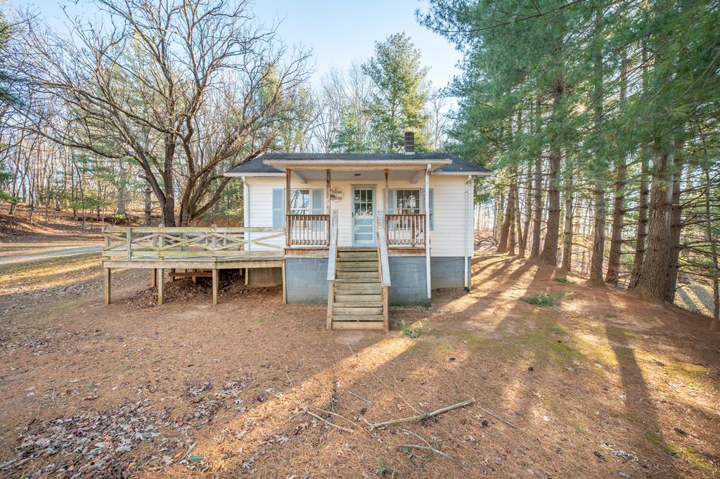 Cute cottage located just minutes from the heart of Stuart on a private lot. This two-bedroom, one-bath home is ready for its new owner to bring a little TLC and make this gem shine. The home is being sold as is. Power is on; however, public water and sewer are not currently turned on. The property would be ideal for an owner-occupant or an excellent investment opportunity. Information is deemed reliable but not guaranteed. Measurements are estimates.
