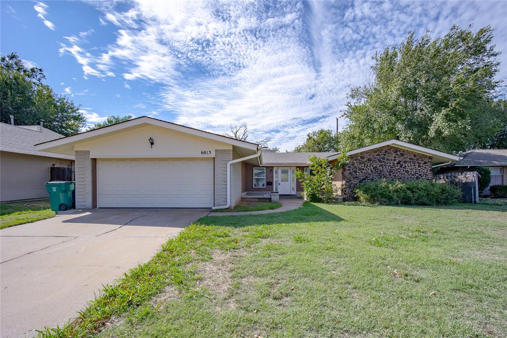 Available for lease now, this home offers 1,755 square feet of functional living space and features three bedrooms and two bathrooms. The spacious main living area serves as a comfortable gathering spot centered around a large fireplace. Outside, enjoy the convenience of an attached two-car garage and a private wood-fenced backyard. Situated within the Putnam City Schools district, this home is near NW Expressway and Hefner Parkway for an easy commute. Enjoy close proximity to local shopping and the trails and recreation at nearby Lake Hefner. Lease terms: 12 month lease at $1,595/mo, $1,595 security deposit, and small pets are allowed on a case-by-case basis with a non-refundable $350 deposit. Schedule your showing today!