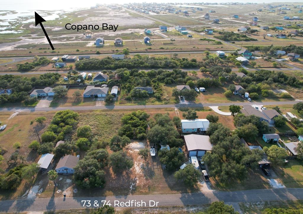 Holiday Beach Double Lot – Ready to Build! Ready to build your dream coastal retreat? This spacious double lot in the charming Holiday Beach community is fully equipped with a septic system, water meter, and electric already installed. With a 500 sq. ft. minimum home requirement and no RVs or mobile homes allowed, you can create a lasting getaway or permanent residence in a well-kept neighborhood.  Property Highlights:  Double Lot: Extra space for your home, garage, or outdoor living area.  Utilities in Place: Septic, water, and electric are already installed—saving you time and money.  Build-Ready: Level and open, perfect for immediate construction.  Community Amenities: For only $100/year, enjoy a pool, boat launch, and private fishing pier—perfect for fishing, boating, and relaxing by the water.  Holiday Beach offers the ideal blend of coastal charm and convenience, with easy access to Rockport's shops, dining, and attractions. Don't miss the opportunity to build your personal paradise in one of the most affordable waterfront-access communities in the area!