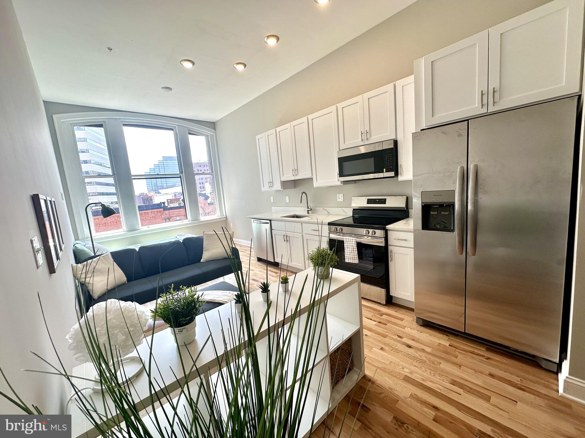 Welcome home to brand new 100 W. Lexington Street! You will love this bright and airy studio apartment in the heart of downtown. The location is ideal as its walking distance to the central business district, restaurants and shopping, MT Vernon, the Charles street corridor, a short bike ride to the University of Baltimore and the University of Maryland, and more. There are various units with sweeping views of the skyscrapers of the central business district and expansive views down liberty street towards the new CFG Arena. The building features high ceilings and lots of light, Stainless steel appliances, quartz countertops, all in one washer dryers, central AC, beautiful lighting, tile bathrooms, hardwood floors and more. The building was completely renovated with all new plumbing, electric, HVAC, sprinklers, elevator and more. Furnished apartments and parking available for an additional cost.