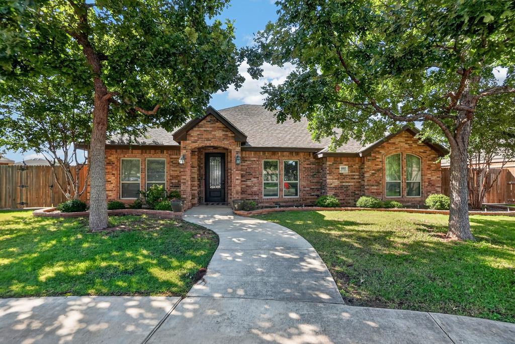 Tucked away in a quiet cul-de-sac, this beautiful home features an open floor plan perfect for entertaining. The sequestered master bedroom offers a private en-suite bath and wrap around walk-in closet. The spacious living room showcases an Austin stone fireplace. Enjoy a large front yard and expansive side yard with plenty of room for a garden. The oversized 3-car garage offers exceptional storage and workspace. Tons of parking space with a huge parking pad. Conveniently located just a short walk from the neighborhood pool! Seller offering 1% towards buyer closing costs.