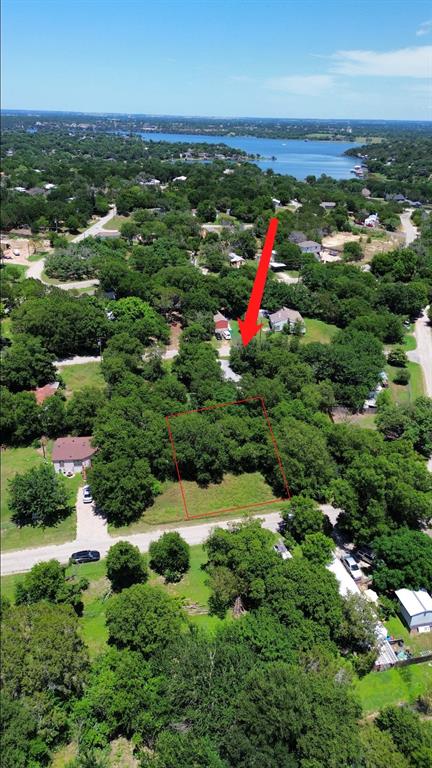 Live the lake life you've been dreaming of with this fantastic vacant lot located in a fun and welcoming waterfront community. Whether you're looking to build a weekend getaway or your forever home, this property gives you the perfect opportunity to create your own slice of paradise.Enjoy easy access to all the amenities that make lake living so special, including a community clubhouse, swimming pool, marina, covered boat slips, boat launch, parks, and walking trails. Spend your weekends boating, fishing, swimming, or simply relaxing and taking in the peaceful surroundings.With plenty of room to bring your vision to life and a community built around outdoor living and lake adventures, this lot is the perfect place to start making memories. Come see why so many people love calling this lakeside community home!