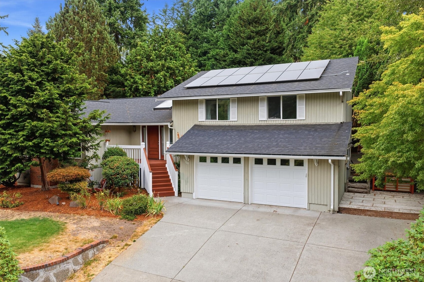 Welcome to this inviting Eaglesmere home, ideally situated on a beautifully landscaped 10,000+ sq. ft. corner lot in Bellevue. The light-filled main level features an updated kitchen, open living room with vaulted ceilings, fireplace and an oversized skylight that fills the space with natural light. A separate family room with a second fireplace provides additional space to relax and gather. Upstairs you'll find three bedrooms and a full hallway bath, including a spacious primary suite with an updated en suite bath. The lower level offers a flexible living space with a wet bar, full size refrigerator, wider doorways and a bath featuring a large shower—ideal for guests, multi-generational living or additional everyday living space. Newly installed solar panels help keep electric costs low and add long-term efficiency. Outside, enjoy mature, well-manicured landscaping, a deck and covered backyard patio for year-round entertaining. This is a very versatile Bellevue home with great indoor and outdoor spaces in the desirable Eaglesmere neighborhood with an amazing suite of Bellevue Schools!