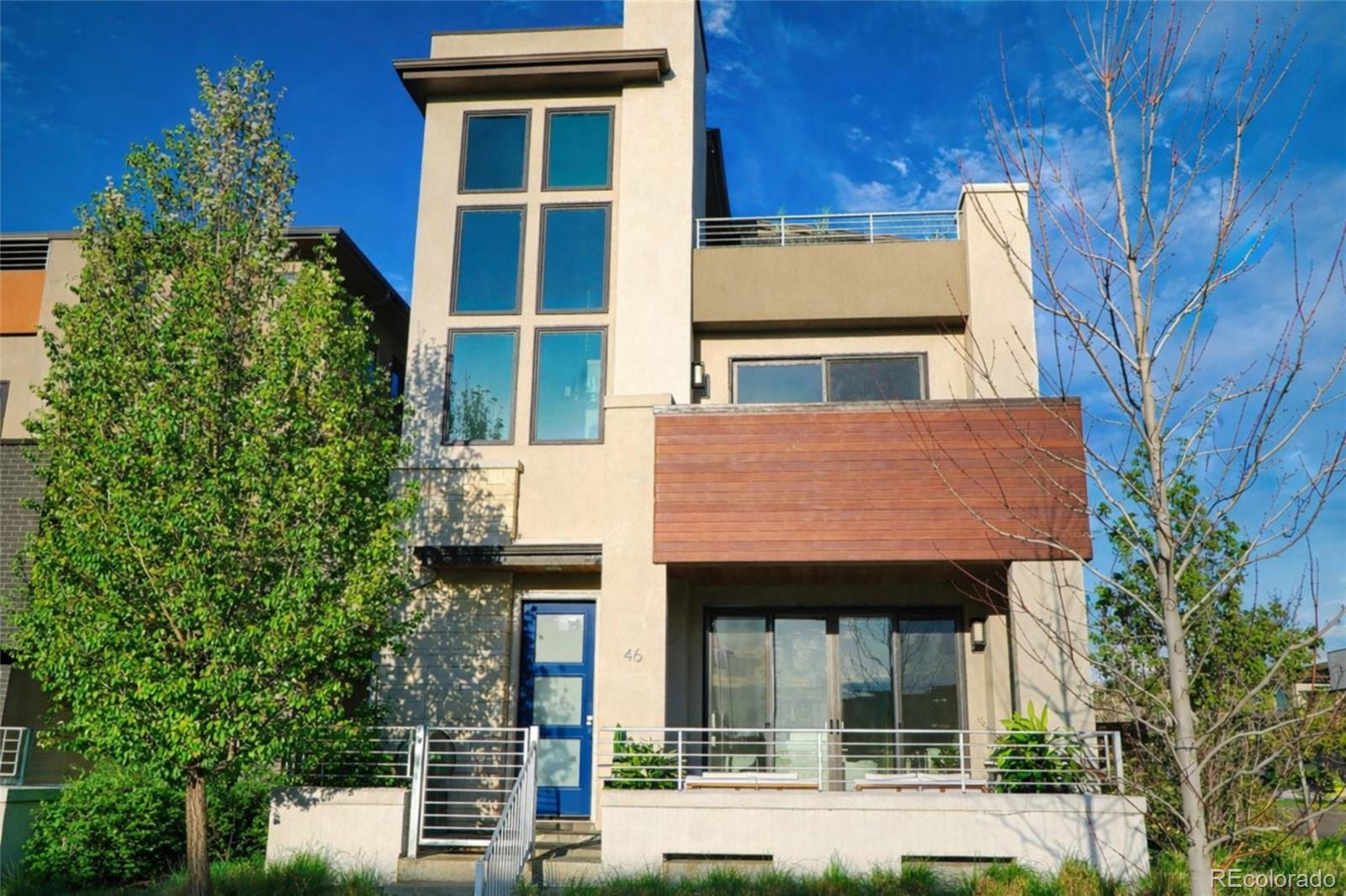 Boulevard One at LowryOriginal fully upgraded model home. Unique corner lot for this light filled 3-bedroom, 5-bath residence offers refined finishes, thoughtful design, and exceptional indoor-outdoor living.The chef’s kitchen includes Thermador stainless steel appliances, quartz countertops, and soft-close cabinetry, opening to an expansive great room with sliding glass doors to a private patio. The primary suite features a private balcony and a luxurious five-piece bath. Each secondary bedroom includes an ensuite bath with quartz finishes.A dramatic staircase leads to the penthouse level and rooftop terrace with city and mountain views. The open basement with high ceilings offers storage and future finish potential.Located just steps from neighborhood Park, Clark’s Market, Denver Beer Company, Target, dining, and Lowry Town Center, with convenient access to Crestmoor Park, Cherry Creek, and Denver International Airport.Luxury, location, and low-maintenance living in one of Denver’s premier communities.