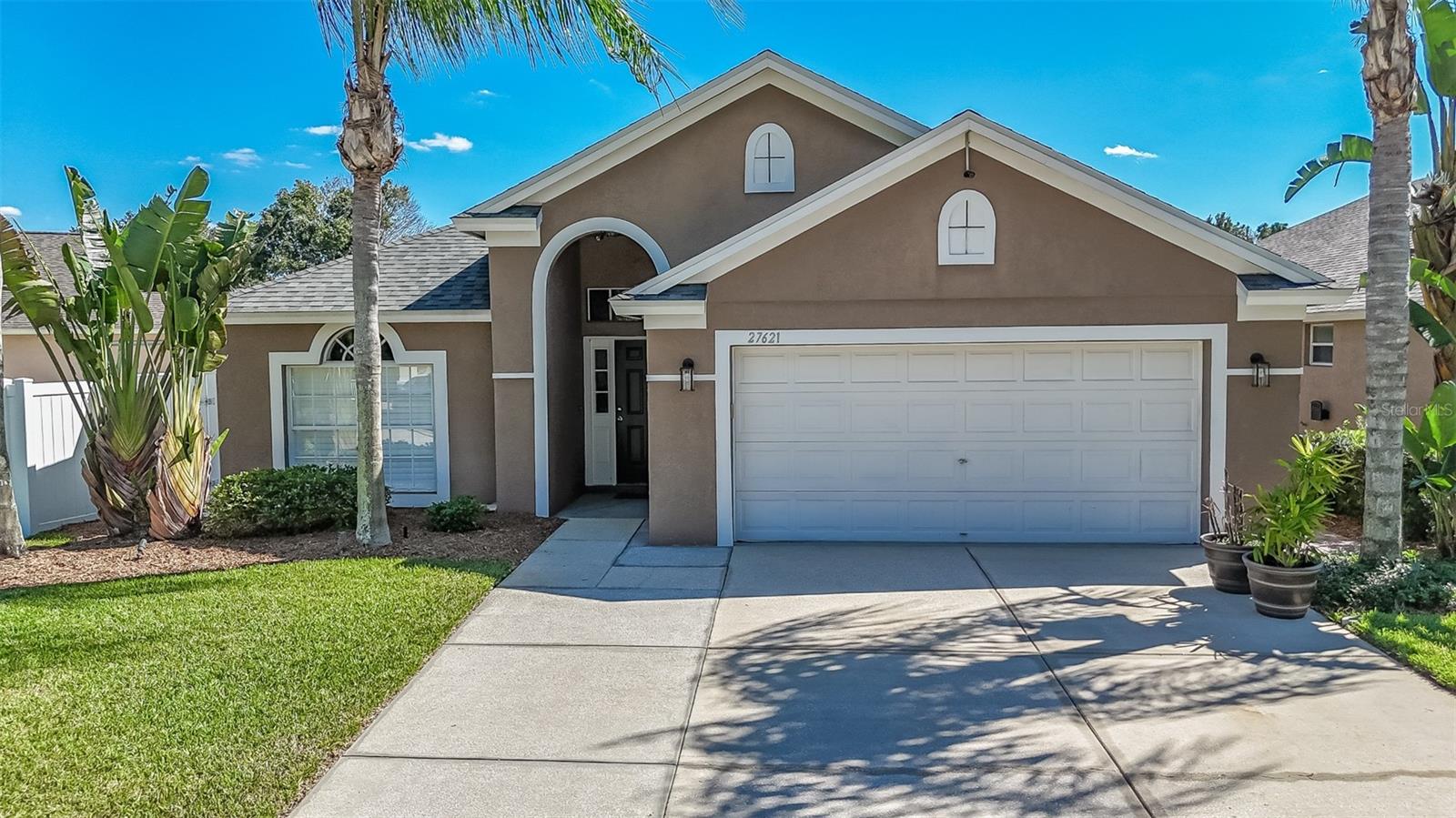 Step inside this beautifully and fully updated 4-bedroom, 3-bath pool home with a 2-car garage and prepare to be impressed! Designed for both comfort and style, this home features a flexible bonus room—perfect for a home office, workout space, hobby room, dining room or whatever best fits your lifestyle. The open-concept floor plan centers around an amazing kitchen with stunning quartz countertops, extended cabinetry reaching to the ceiling, soft-close cabinets and drawers, a large pantry, and modern finishes that make it as functional as it is beautiful. The kitchen overlooks the great room, allowing you to stay connected with family and guests while cooking or entertaining—a feature everyone will appreciate. All bedrooms include ceiling fans for added comfort and energy efficiency, and the home features beautiful, durable flooring throughout with no carpeting anywhere—a huge plus for easy maintenance and a cleaner, allergy-friendly environment. Step outside to your private backyard oasis featuring a sparkling saltwater pool and spa surrounded by brick pavers, with plenty of room for outdoor dining or lounging. The fully fenced yard provides peace of mind for little ones or pets to play freely, as well as added privacy for relaxing poolside. The primary suite is a true retreat, complete with an attached bath featuring quartz counters, dual sinks, a separate shower, and a garden tub—plus a spacious walk-in closet. Throughout the home, you’ll find elegant touches such as plantation shutters and 5¼-inch baseboards, adding timeless style and sophistication. Located just minutes from top-rated schools, shopping malls, restaurants, hospitals, and major roadways, this home offers the perfect blend of luxury and convenience. Homes like this don’t stay on the market long—schedule your appointment today before it’s gone!