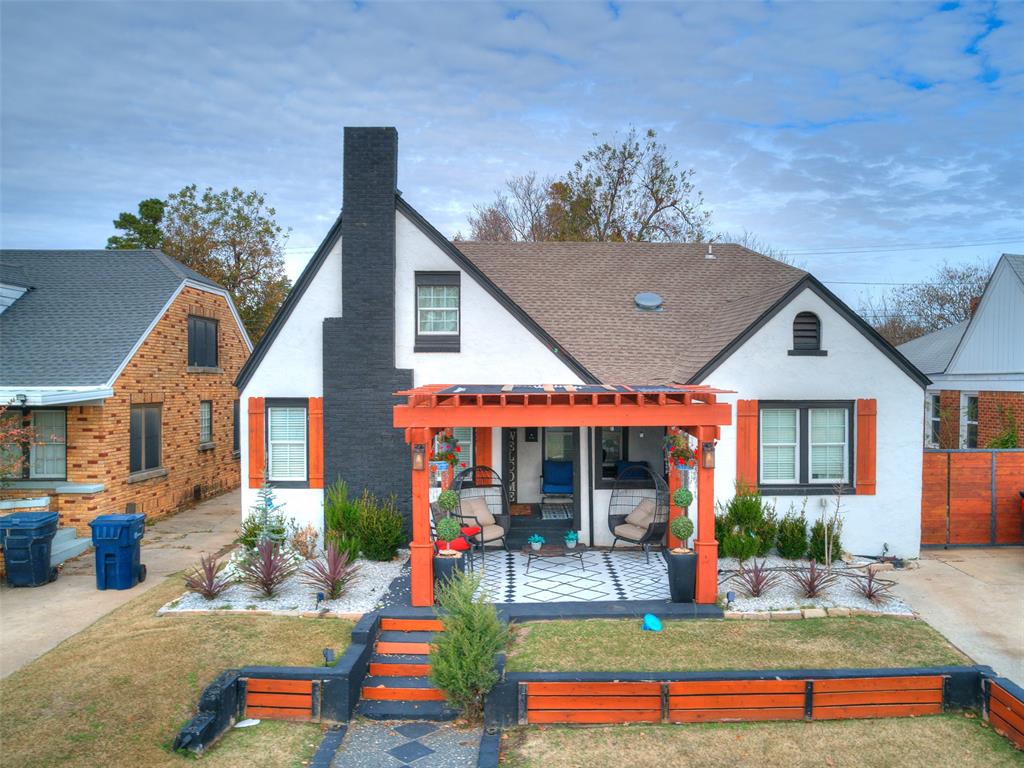 Two amazing structures on the same property. Delightfully remodeled It's almost like having two homes together! This home is fabulous, and you will be able to understand the love and care this seller went to make this house a home! It all starts at the curb. When you pull up to the home you will like what you see. Every detail the seller made to make this the perfect home, will be obvious. Starting with the front porch, and its attention to detail. The stained wood gazebo style covering, to the exquisite paint will want you to see more. Another attractive feature to this property is the beautiful, stained fence. It's new and it really makes this place pop! The seller is leaving all the appliances, decorations, and furnishings (turnkey). He is also leaving all the mower and yard equipment. He is leaving almost everything. Washer/Dryer (2 sets), refrigerators (2). The home is also entirely electric. The home has the prettiest real wood flooring you've ever seen. It also has new tile and new carpet. The kitchen offers lovely black granite counter-top, with brick backsplash topped off with a wood ceiling. The living room is not shabby either. It has an electric fireplace with stunning stacked stone surrounding it. The primary bedroom does not disappoint you either and I'm not even going to try to describe the shower (It's awesome!). It also has a sprinkler system. One last thing about the main home, the pantry is one of the nicest features of this home (It's huge). Let's move on to the second structure. It is an entirely a different structure in the back yard. It's basically an amazing guest home, man cave, you name it! It has a 2-car garage on one side, and a first-class wood shop on the other!! The location of this home is located very close to historical districts and is not far from anything! Please come look at this home soon, because there is no way i can put into words the beauty and value of this home.