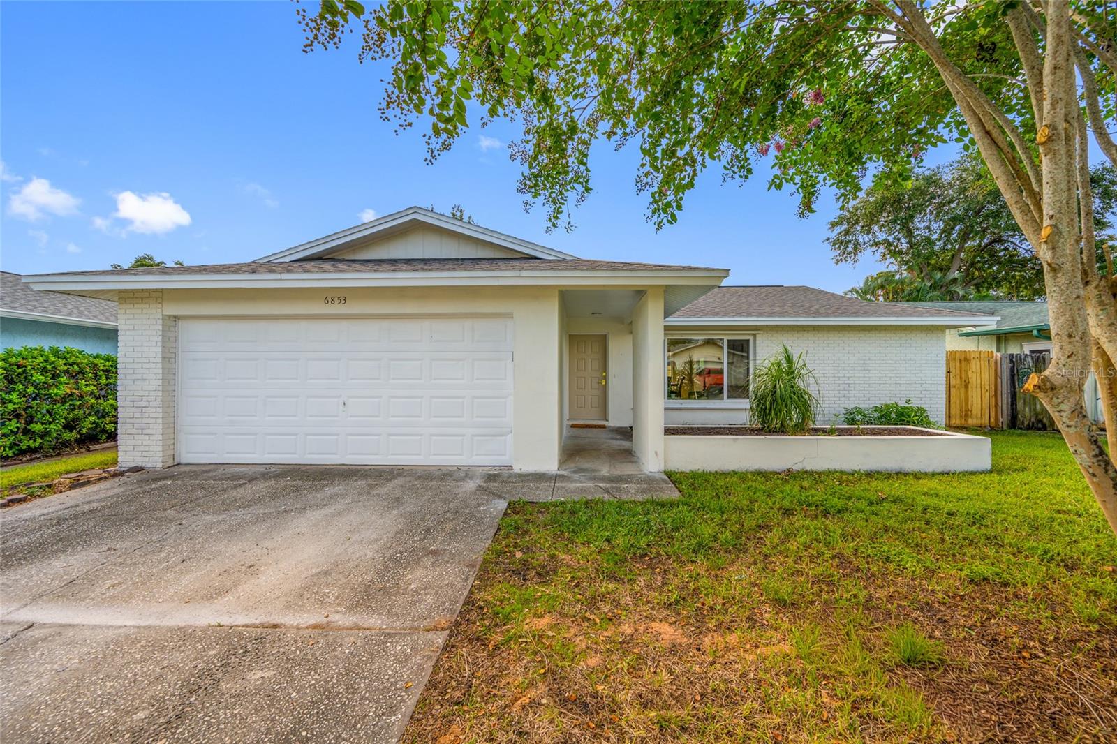 Completely Renovated Pool Home Just Minutes from Florida's Award-Winning Beaches – Short-Term Rentals Allowed!Welcome to this stunning 3-bedroom, 2-bathroom home in the heart of Pinellas Park, where every detail has been thoughtfully updated to create a truly move-in-ready retreat. With short-term rentals allowed, this property also offers excellent potential as a vacation rental or investment opportunity.Step inside to an inviting open floor plan highlighted by a spacious living room with soaring vaulted ceilings and a beautiful fireplace, creating the perfect space to relax or entertain.The designer kitchen is the centerpiece of the home, featuring white shaker cabinetry, gorgeous Calacatta quartz countertops, stainless steel appliances, and abundant cabinet and counter space. Beautiful luxury vinyl plank flooring flows throughout, offering both style and durability.Both bathrooms have been completely remodeled with designer finishes, creating a luxurious spa-like atmosphere.Step outside to your own private backyard oasis featuring a freshly remodeled in-ground pool with a new interior finish, new waterline tile, a new LED pool light, and a freshly coated pool deck, making it the perfect place to enjoy Florida's year-round sunshine. The backyard is fully enclosed with a brand-new privacy fence, providing the ideal setting for entertaining, relaxing, or letting pets and children play.Additional improvements include a new electrical panel, offering added peace of mind.Ideally located just minutes from Madeira Beach, Treasure Island, St. Pete Beach, and vibrant downtown St. Petersburg, you'll enjoy easy access to world-famous Gulf beaches, waterfront parks, shopping, dining, and entertainment while remaining close to major highways, airports, and everyday conveniences.Whether you're looking for a primary residence, a second home, or a high-demand investment property, this beautifully renovated pool home checks every box. With designer finishes throughout, a resort-style backyard, and short-term rentals permitted, this is a rare opportunity to own a turnkey home in one of Pinellas County's most desirable and convenient locations.