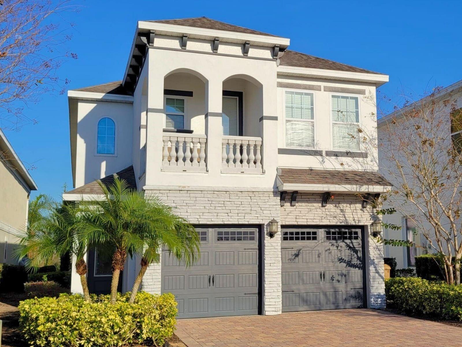 Located in the world-renowned Reunion Resort (witn ACTIVE Reunion Resort Membership), 795 Golden Bear Drive is a stunning 5-bedroom, 5.5-bathroom luxury villa that blends sophisticated transitional design with an unparalleled entertainment experience. Professionally decorated with vibrant Florida-inspired colors, this Crestview model serves as an ideal primary residence, a getaway in the Florida sunshine or an income producing vacation investment property.Luxurious Living Spaces: The open-concept floor plan creates an inviting atmosphere for gathering.Gourmet Kitchen: Features solid wood cabinets, high-end stainless steel appliances, granite countertops, and a center island with a breakfast bar.Master Suites: Includes three spacious King en-suites, with the primary master located conveniently on the first floor.Guest Bedrooms: Two additional bedrooms feature custom reading nooks and private attached baths.Elite Entertainment WingDesigned for the ultimate guest experience, the home features dedicated spaces for fun and relaxation.Private Home Theater: A fully air-conditioned, 9-seat theater with a massive 150" projection screen.Loft Game Room: A vibrant space complete with foosball, air hockey, pinball, and classic arcade machines.Outdoor Oasis: Step outside to a south-facing backyard designed to maximize the Florida lifestyle.Heated Pool & Spa: A 21x17 heated gunite pool and bubbling spillover spa overlooking the lush pond and golf course views.Summer Living: The shaded patio includes a natural gas grill connection, perfect for al fresco dining against the backdrop of the legendary Jack Nicklaus Tradition course.Premier Resort AmenitiesAs part of the 2,300-acre Reunion Resort, owners and guests enjoy a wealth of elite amenities.Signature Golf: Three world-class courses designed by Jack Nicklaus, Arnold Palmer, and Tom Watson.Resort membership: Active Reunion Resort membership conveys to owners and guests, providing full access to resort amenities. Membership is currently closed to new enrollments, making this an especially valuable feature for owners seeking maximum rental income.Location: Situated just 7 miles from Walt Disney World®, providing the perfect balance of resort serenity and theme park proximity.