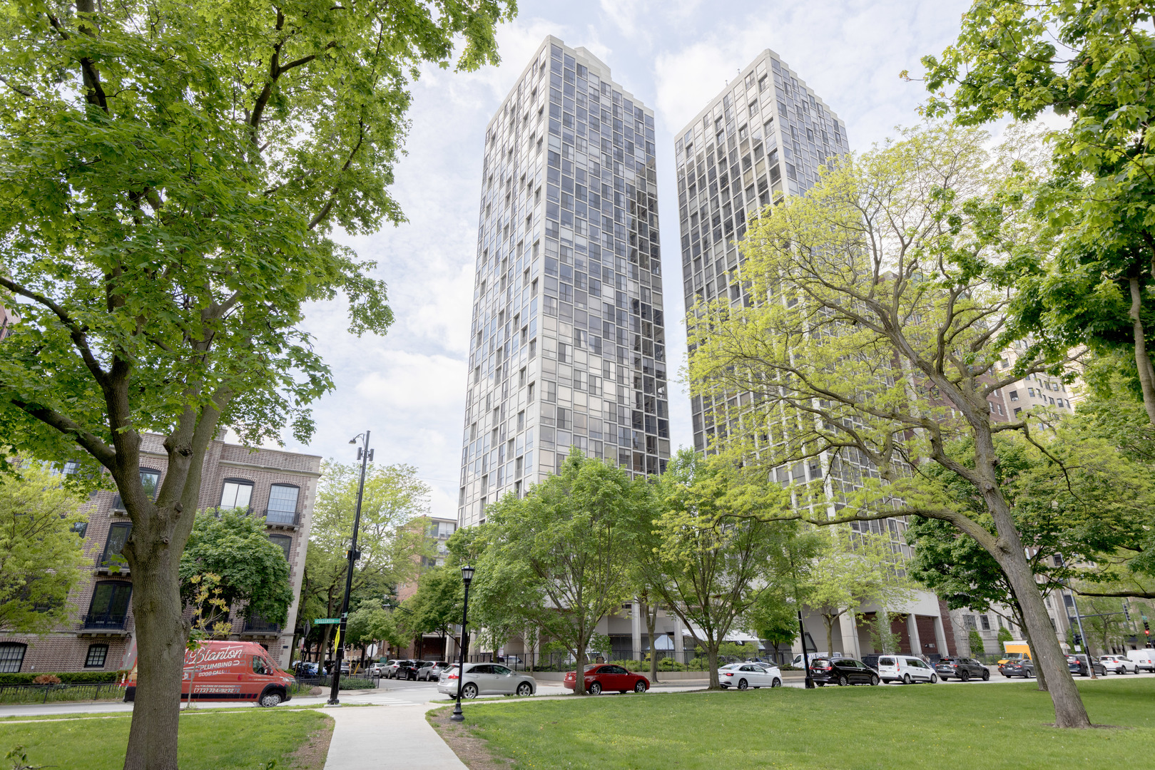 Stunning, One-of-a-Kind combined Condo with Sweeping Lake Views at 345 W Fullerton. Welcome to luxury living in one of Lincoln Park's most coveted full-amenity buildings. This expansive, recently updated condo spans over 1,500 square feet and offers a truly unique layout with floor-to-ceiling windows that frame breathtaking views of Lake Michigan, Lincoln Park, and a perfect 10th floor perspective of the tree tops and the horizon. Upgraded with modern finishes, this beautifully combined unit features an open-concept living and dining space, perfect for entertaining or relaxing while soaking in natural light and panoramic vistas. The kitchen boasts stainless steel appliances, quartz countertops, sleek cabinetry, and a custom backsplash. Spacious bedrooms include ample closet space and tranquil views, with tons of built-ins through out, while the bathrooms have been tastefully renovated with contemporary fixtures and spa-inspired finishes.  This home is as functional as it is beautiful, offering generous storage, stone and hardwood flooring throughout, and thoughtful design details that elevate the space.  345 W Fullerton is a highly sought-after full-service building offering 24-hour door staff, an on-site management team, fitness center, valet parking, bike storage, and more. Assessments include heat, A/C, cable, internet, and water, providing stress-free living in the heart of the city.  Located in the prime heart of Lincoln Park, just steps from the lakefront, North Pond, Lincoln Park Zoo, and the Nature Boardwalk, you'll enjoy easy access to Chicago's best dining, boutique shopping, coffee shops, and public transportation. Walk to the beach in minutes, or take a morning run along the Lakefront Trail just outside your door.  This is a rare opportunity to own a truly special, move-in-ready residence in one of Chicago's most iconic and desirable neighborhoods.