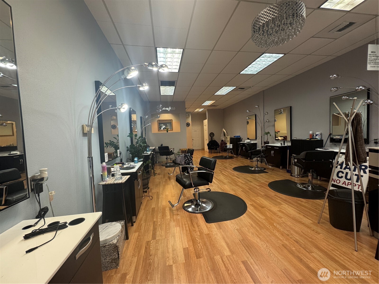 Fantastic opportunity to own a turnkey hair salon located in a high-traffic area of Bellevue, Washington (98007). This established business offers a loyal client base, consistent revenue history, and a well-maintained space ready for immediate operation. The salon is fully built out with multiple styling stations, wash basins, and a welcoming reception area, allowing a new owner to step in and start generating income from day one. With a favorable lease structure and 4 years remaining, this is an ideal setup for an owner-operator or investor looking to enter or expand within the Eastside market. The business also benefits from a strong online presence, with 200+ Google reviews averaging 4.5 stars, reinforcing its reputation and consistent customer satisfaction. There is significant upside potential for a new owner, including the ability to add nail services and esthetician offerings, as well as increase revenue by renting out available styling stations (chair rental income). Located in a desirable Bellevue corridor with strong demographics, this is a rare opportunity to acquire an affordable, established salon with immediate income and clear paths for growth.