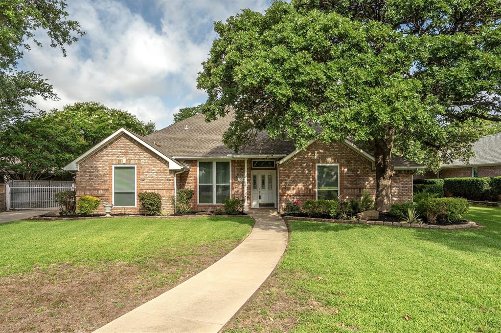 **Multiple offers received. Highest and best due by noon CST on Monday, 6-30-2025. Welcome to your dream home in the heart of Grapevine! This beautifully updated one story 4-bedroom, 3.5-bath home sits on nearly half an acre and offers a rare combination of space, style, and convenience. Fully renovated in 2023, you'll love the finishes—no carpet anywhere, walk-in showers, and a spacious second living area and formal dining perfect for entertaining, relaxing, or hosting guests. Need extra room for hobbies or work? The detached 576 sf 1-car garage features 220V power, a large workshop, a half bath, and even a finished 384 sf second-floor bonus room with AC—ideal for a home office, craft room, climate controlled storage, man cave or teenager hangout! There's also plenty of room to park an RV or boat behind the electric gate without sacrificing the large backyard. Located within walking distance to both Cannon Elementary and Grapevine Middle School, just 2 miles from Historic Main Street Grapevine, under 3 miles to Lake Grapevine, and only 10 minutes to DFW Airport, this home keeps you close to everything while still offering a private, suburban feel.