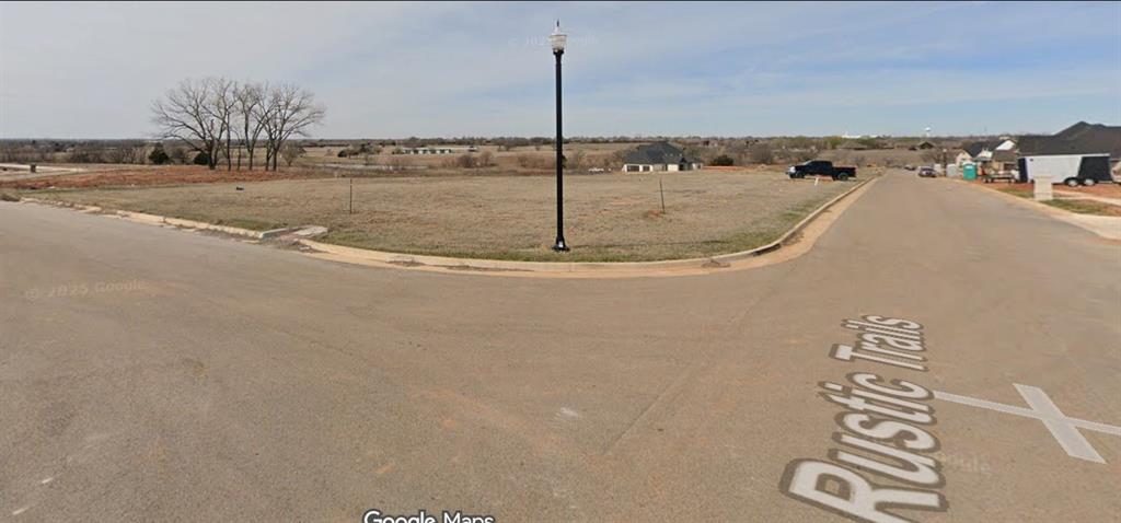Great Corner lot. High on the hill. New home will have a great view of the sunset.Plans must be approved
