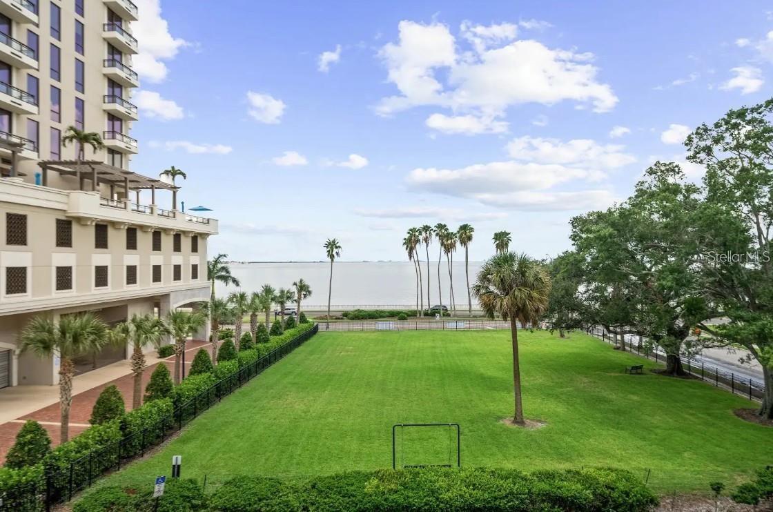 Own a piece of Tampa history along iconic Bayshore Boulevard. Welcome to Residence #303 at the historic Bayshore Royal, a distinctive South Tampa landmark dating to 1924 and recognized as the first high-rise built along Bayshore Boulevard. Originally known as the Bayshore Royal Hotel, this storied building has watched Tampa transform for more than a century, offering a rare opportunity to enjoy modern-day South Tampa living within a piece of the city’s architectural past. This fully furnished, one-bedroom, one-bath residence offers a comfortable, efficient layout highlighted by beautiful views of Hillsborough Bay and Bayshore Blvd. Inside, wood flooring and crown molding add warmth and character, while plantation shutters complement the home’s classic style. The kitchen features solid-wood cabinetry, granite countertops, stainless-steel appliances and a breakfast bar, creating an inviting space for both everyday living and entertaining. Yet perhaps the greatest amenity is just outside your door. Step onto Bayshore Boulevard for morning walks, waterfront runs and bike rides along one of Tampa’s most recognizable stretches of shoreline. From here, you’re positioned in the heart of South Tampa, moments from the dining and nightlife of SoHo, including Tampa institutions such as Bern’s Steak House, and convenient to the boutiques, restaurants and cafés of Hyde Park Village. Downtown Tampa, Water Street, Tampa General Hospital, Amalie Arena, the University of Tampa and the Tampa Riverwalk are all within easy reach. Bayshore Royal residents enjoy a community pool surrounded by lush landscaping, BBQ area, dry sauna, bike storage, laundry facilities and reserved parking, while the building’s coveted Bayshore address puts some of Tampa’s signature traditions practically at your doorstep—including a front-row location for the energy and festivities surrounding Gasparilla. From its beginnings as the Bayshore Royal Hotel more than a century ago to its place along one of Tampa’s most celebrated boulevards today, Bayshore Royal Condominium offers something increasingly difficult to replicate: history, character, water views and an exceptional South Tampa location. Whether you’re searching for a primary residence, Tampa pied-à-terre or low-maintenance home base, Residence #303 offers the opportunity to experience the Bayshore lifestyle from one of its original landmarks.