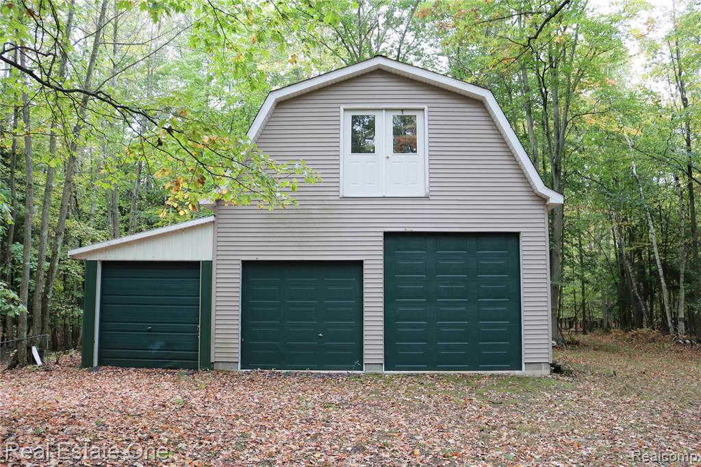 Hunters Dream!  Gorgeous 42.5 Acres in Sterling with gorgeous mature trees such as Oaks, Maples, different Pines and Beech trees. the first 12.5 acre parcel has a drive and features a 24x32 barn with block foundation, cement floor, 2nd floor that could be turned into a living space!  Barn features 11 foot ceilings, oversized 10 foot door and an 8 foot door, 22x10 add on has a dirt floor but great for storage. Barn has some wiring set up for lights to be run off a generator.  As you wind through the parcel you will see a nice area for hunting with old blind and in a lower area called the "Cedar Swamp". The back 30 acres is very rolling, crossing a few creek beds, a few more hunting spots with old blinds. This property was part of an old logging camp so the road is an old logging trail. Once to the back of the property you can see the neighbors field and a glimpse of Melita Road. If your not looking to hunt this could be a perfect nature lovers dream with trails to walk, possibility of building your dream home.  Property is about 12 miles to Standish and about 15 minutes to Exit 190 off I75.     *Do not walk property without an appt*