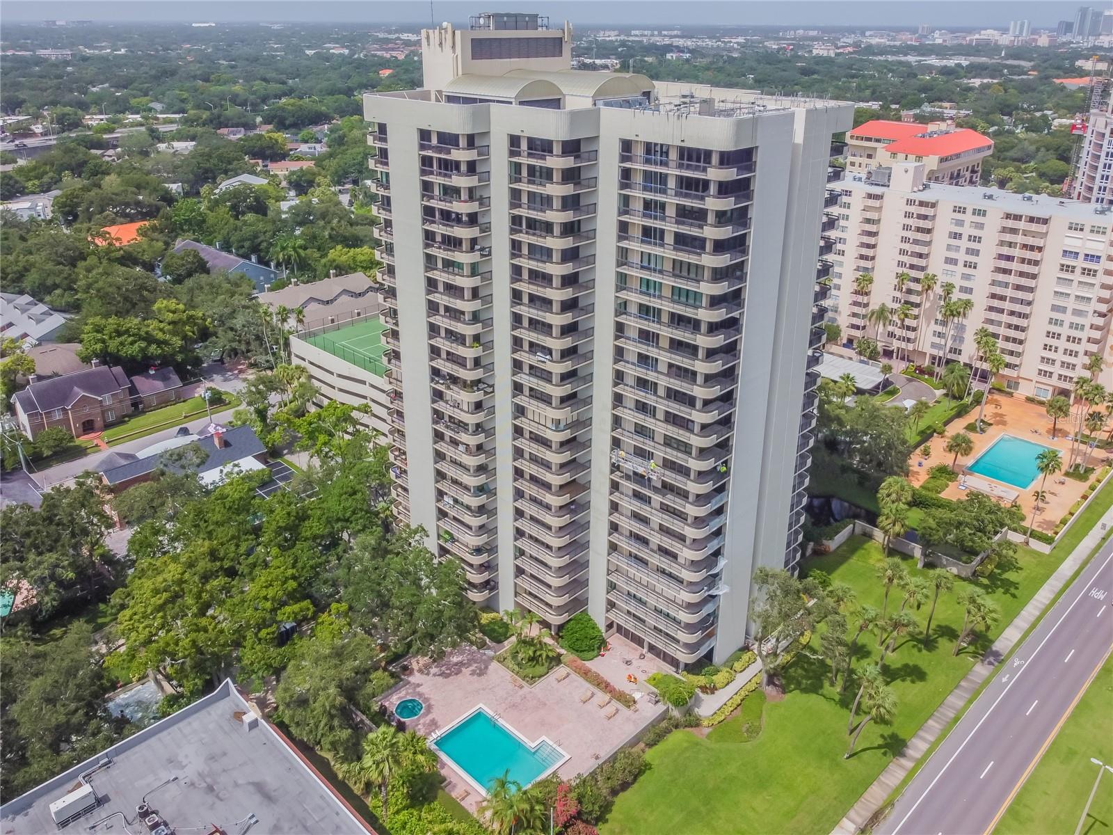 Short Sale. Perched high on the 20th floor of The Atrium on iconic Bayshore Boulevard, this recently remodeled residence invites you into a lifestyle defined by light, views, and effortless sophistication. Step inside and you’re immediately drawn to the wall of glass—two expansive sliding doors that flood the open-concept living space with natural light and frame sweeping Bay and downtown skyline panoramas. With raised ceilings overhead and luxury vinyl plank flooring underfoot, the home feels airy, polished, and beautifully current.Two private balconies extend the living experience outdoors, offering front-row seats to Tampa’s ever-changing waterfront and cityscape—perfect for sunrise coffee, evening cocktails, or simply watching the skyline glow after dark.At the heart of the home, a custom gourmet kitchen has been thoughtfully updated with newer appliances (2022), modern lighting, and designer finishes that blend style with everyday ease. Whether you’re entertaining guests or enjoying a quiet night in, the flow from kitchen to living to balcony makes it all feel seamless.The primary suite is a true retreat above the city, generously sized and complemented by its own private balcony with unobstructed downtown views—your own peaceful escape in the sky. A flexible secondary room is currently styled as a home office with French doors that open to the main living space, and a Murphy bed that transforms it into comfortable guest accommodations in seconds.This residence offers two bedrooms, two bathrooms, a dedicated laundry room with full-size washer and dryer, and two assigned parking spaces. Life at The Atrium feels like a daily getaway, with resort-style amenities including a 24-hour staffed front desk and security, on-site management, a heated bayfront pool and spa, tennis courts, a fully equipped fitness center, and a quiet library for downtime.Perfectly positioned along Bayshore Boulevard, you’re just a short stroll to Howard Avenue and the heart of Hyde Park—Tampa’s best dining, nightlife, and boutique shopping—while downtown Tampa, Tampa General Hospital, Tampa International Airport, major shopping, and Gulf Coast beaches are all within easy reach.Come experience elevated bayfront living in one of Tampa’s most desirable high-rise communities—schedule your private showing today.